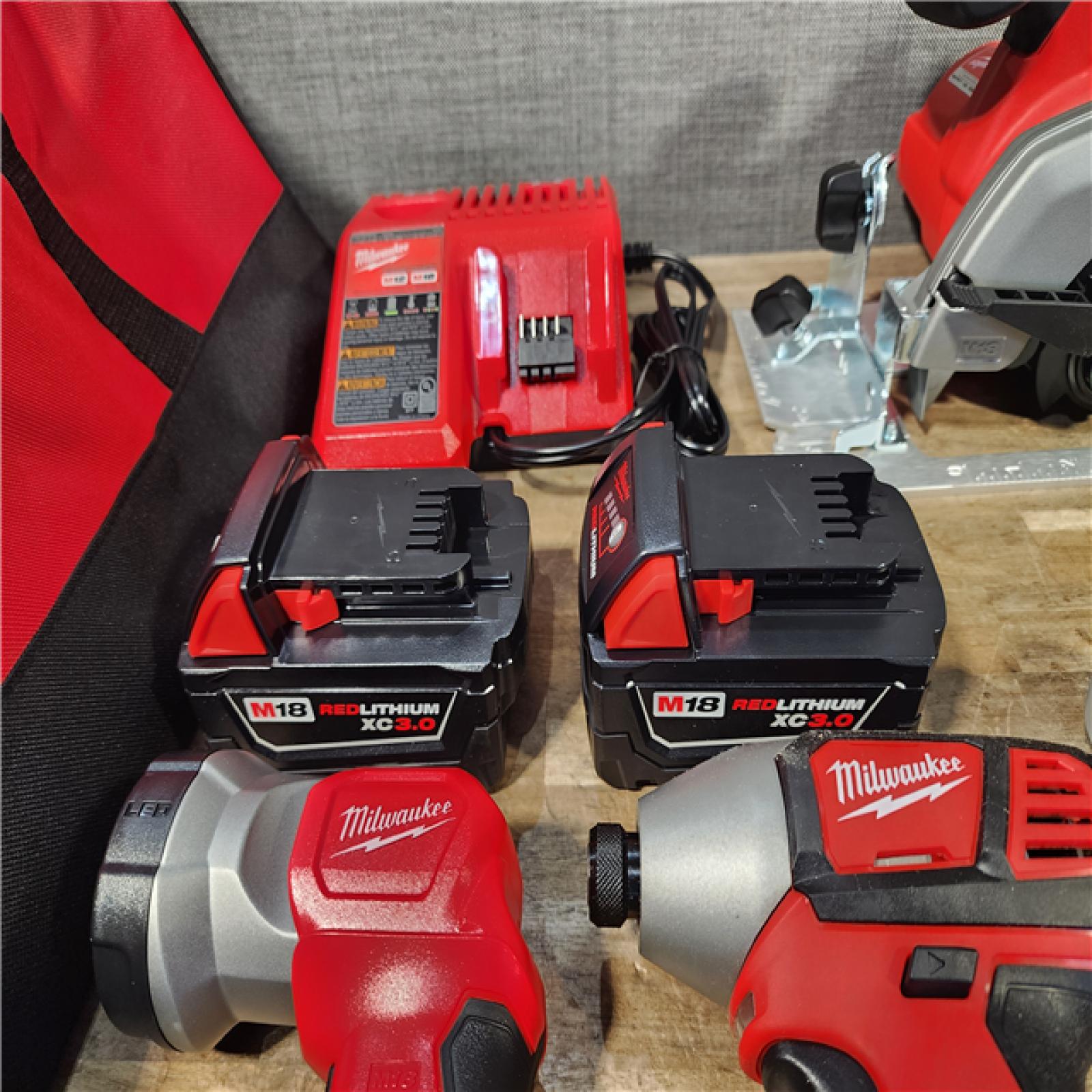 HOUSTON LOCATION - AS-IS (APPEARS LIKE NEW) M18 18-Volt Lithium-Ion Cordless Combo Kit 7-Tool with 2-Batteries  Charger and Tool Bag