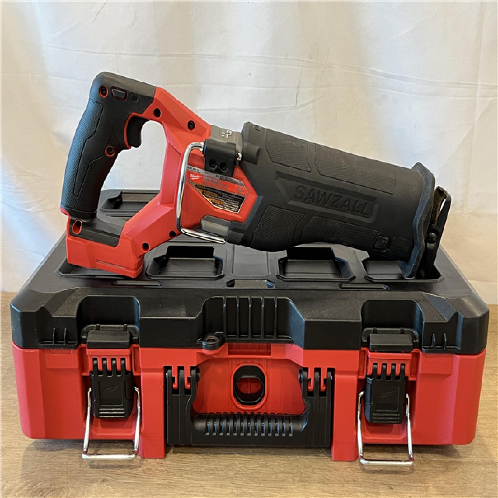 AS-IS MILWAUKEE M18 FUEL18V Lithium-Ion Brushless Cordless SAWZALL Reciprocating Saw with PACKOUT Tool-Box  (1) 5.0 Battery  and Charger