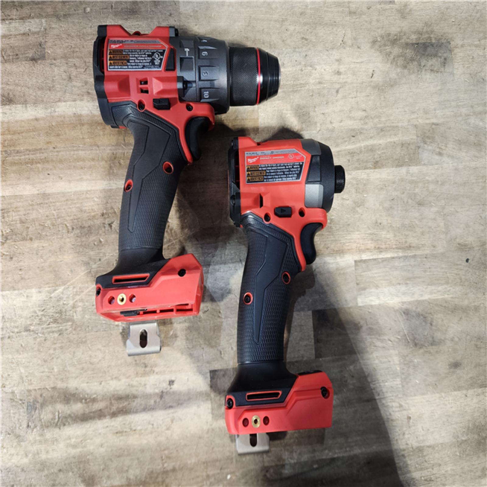HOUSTON LOCATION - AS-IS Milwaukee FUEL 18V Lithium-Ion Brushless Cordless Hammer Drill and Impact Driver Combo Kit