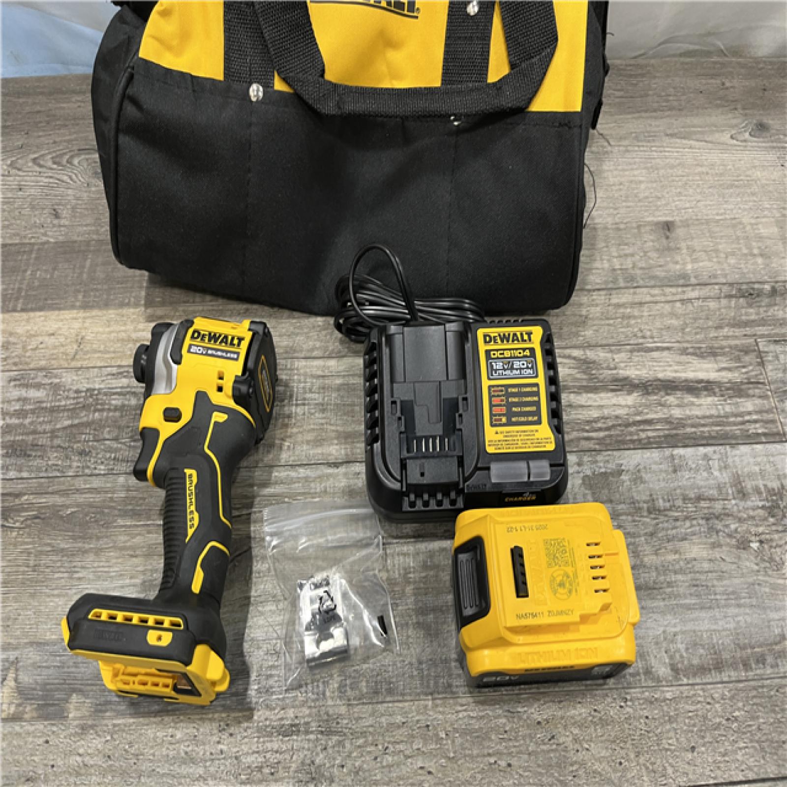 AS-IS DEWALT ATOMIC 20V MAX Lithium-Ion Cordless 1/4 in. Brushless Impact Driver Kit