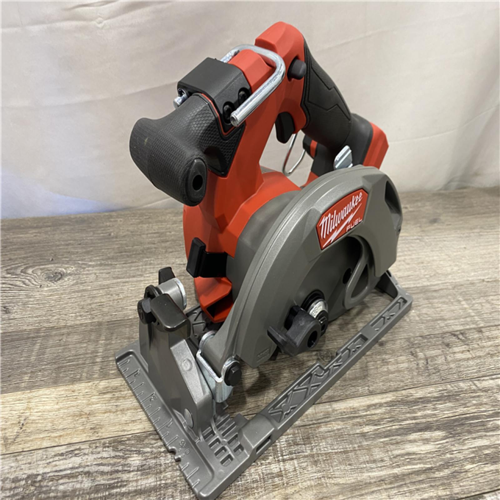 AS-IS Milwaukee FUEL 18V Lithium-Ion Brushless Cordless 6-1/2 in. Circular Saw (Tool-Only)