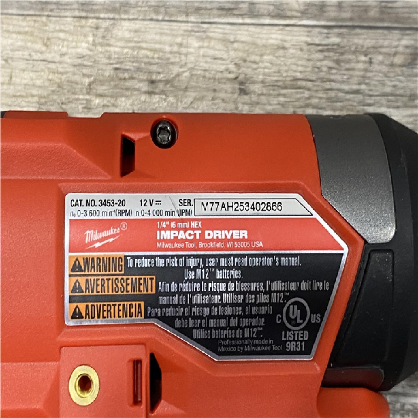 AS-IS Milwaukee FUEL 12-Volt Lithium-Ion Brushless Cordless 1/4 in. Hex Impact Driver Compact Kit