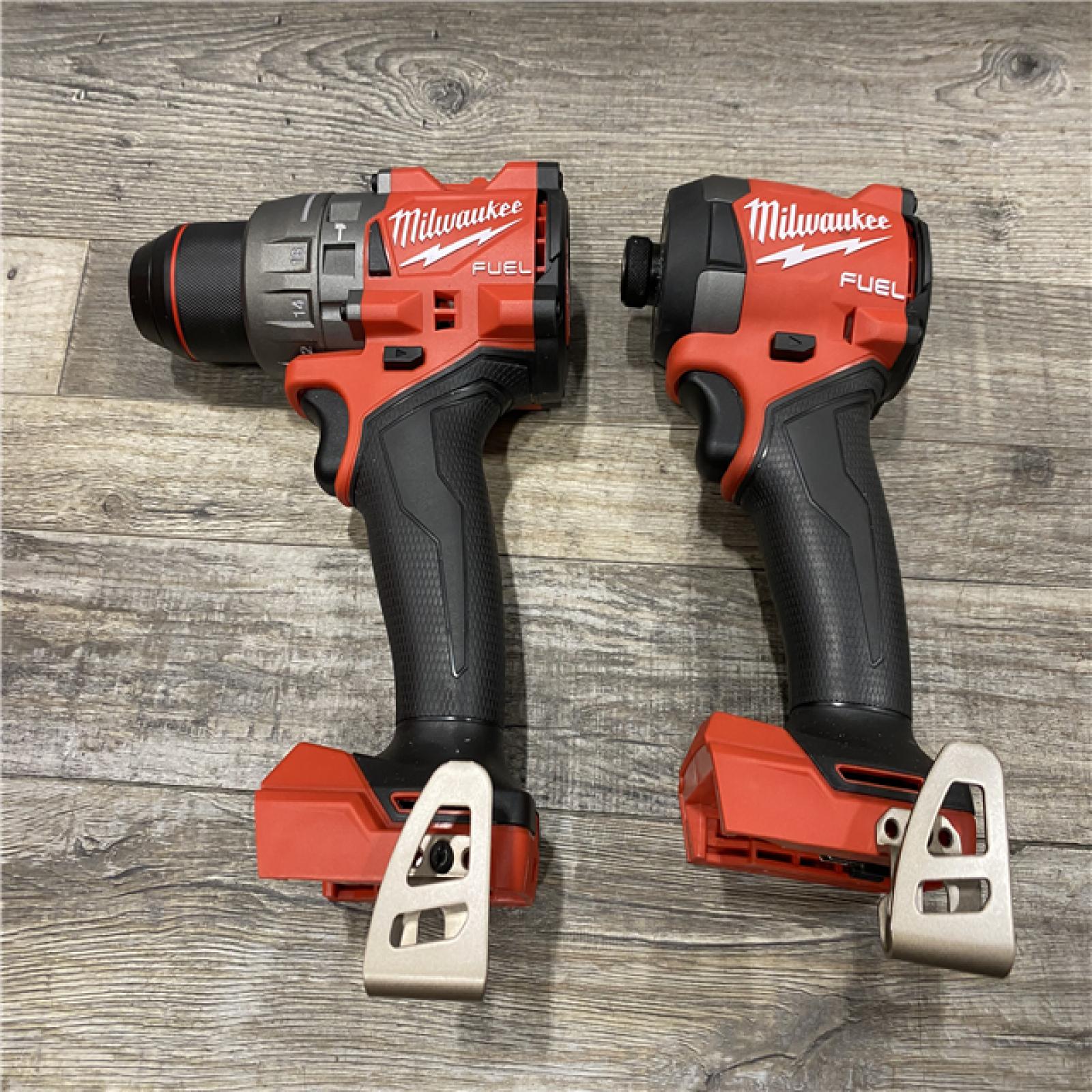 AS-IS Milwaukee FUEL 18V Lithium-Ion Brushless Cordless Hammer Drill and Impact Driver Combo Kit
