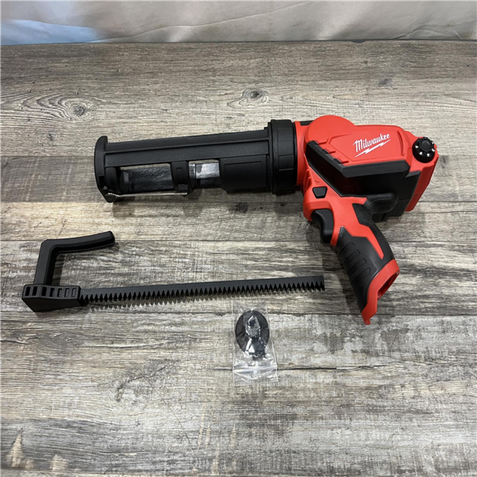 AS-IS Milwaukee 12V Lithium-Ion Cordless 10 oz. Adhesive and Caulk Gun (Tool-Only)