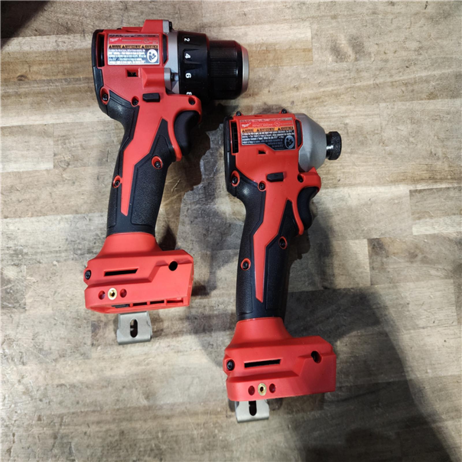 HOUSTON LOCATION - AS-IS Milwaukee M18 18V Lithium-Ion Brushless Cordless Compact Drill/Impact Combo Kit (2-Tool) W/(2) 2.0 Ah Batteries  Charger & Bag