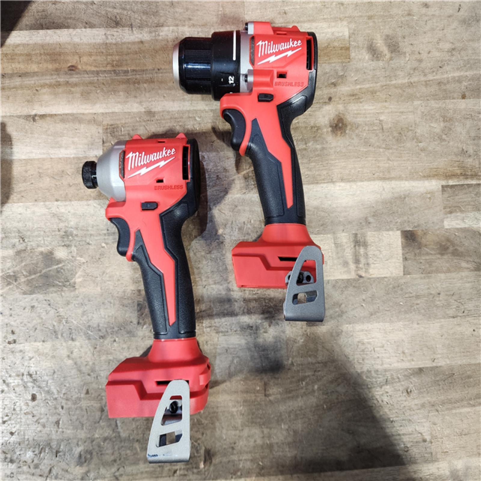 HOUSTON LOCATION - AS-IS Milwaukee M18 18V Lithium-Ion Brushless Cordless Compact Drill/Impact Combo Kit (2-Tool) W/(2) 2.0 Ah Batteries  Charger & Bag