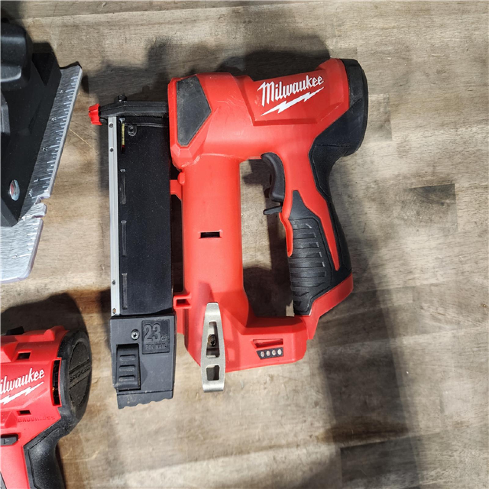 HOUSTON LOCATION - AS-IS Milwaukee M18 18-Volt Lithium-Ion Brushless Cordless Combo Kit (4-Tool) with 2-Batteries  1-Charger and Tool Bag