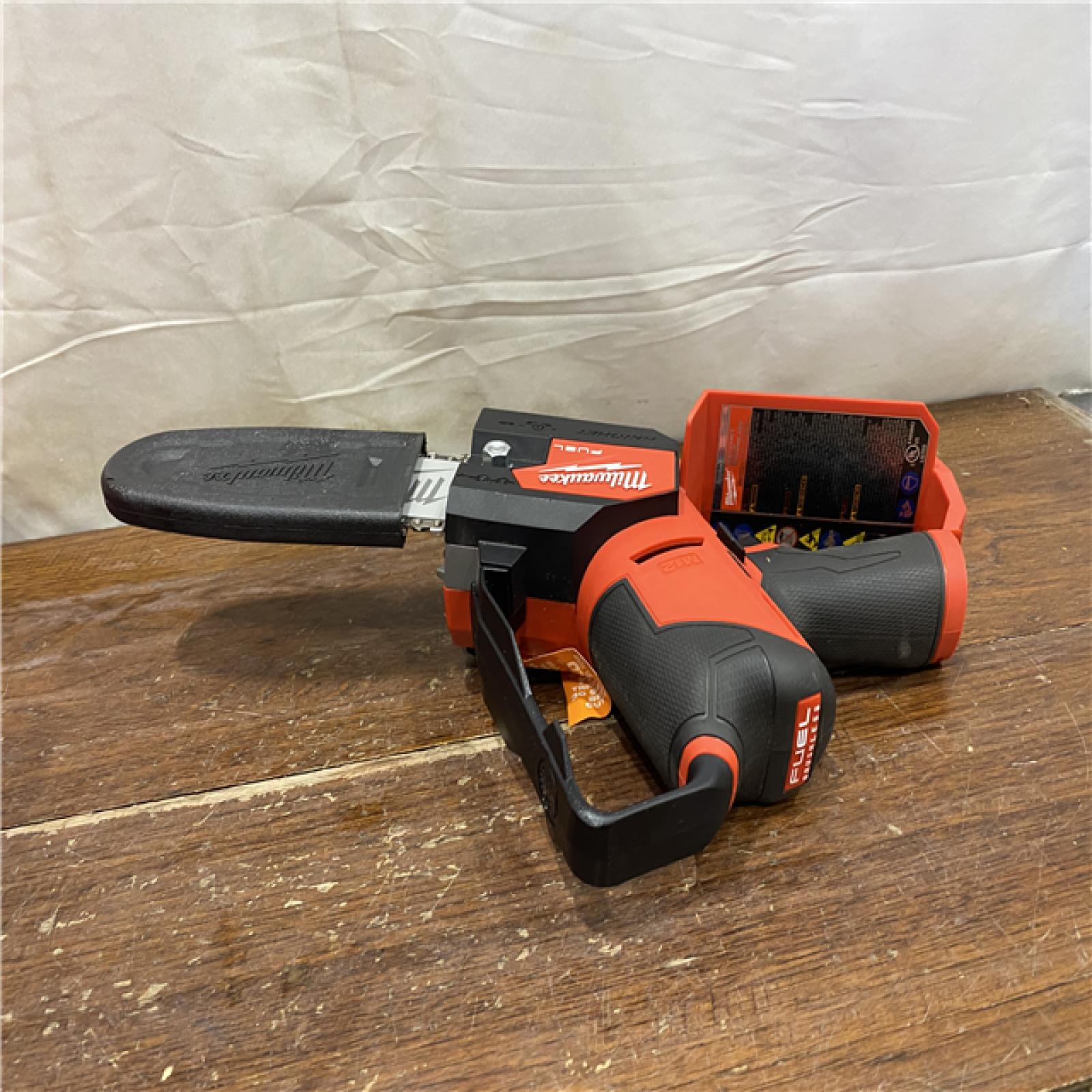 AS-IS Milwaukee-2527-21 M12 FUEL HATCHET 6in. Pruning Saw Kit