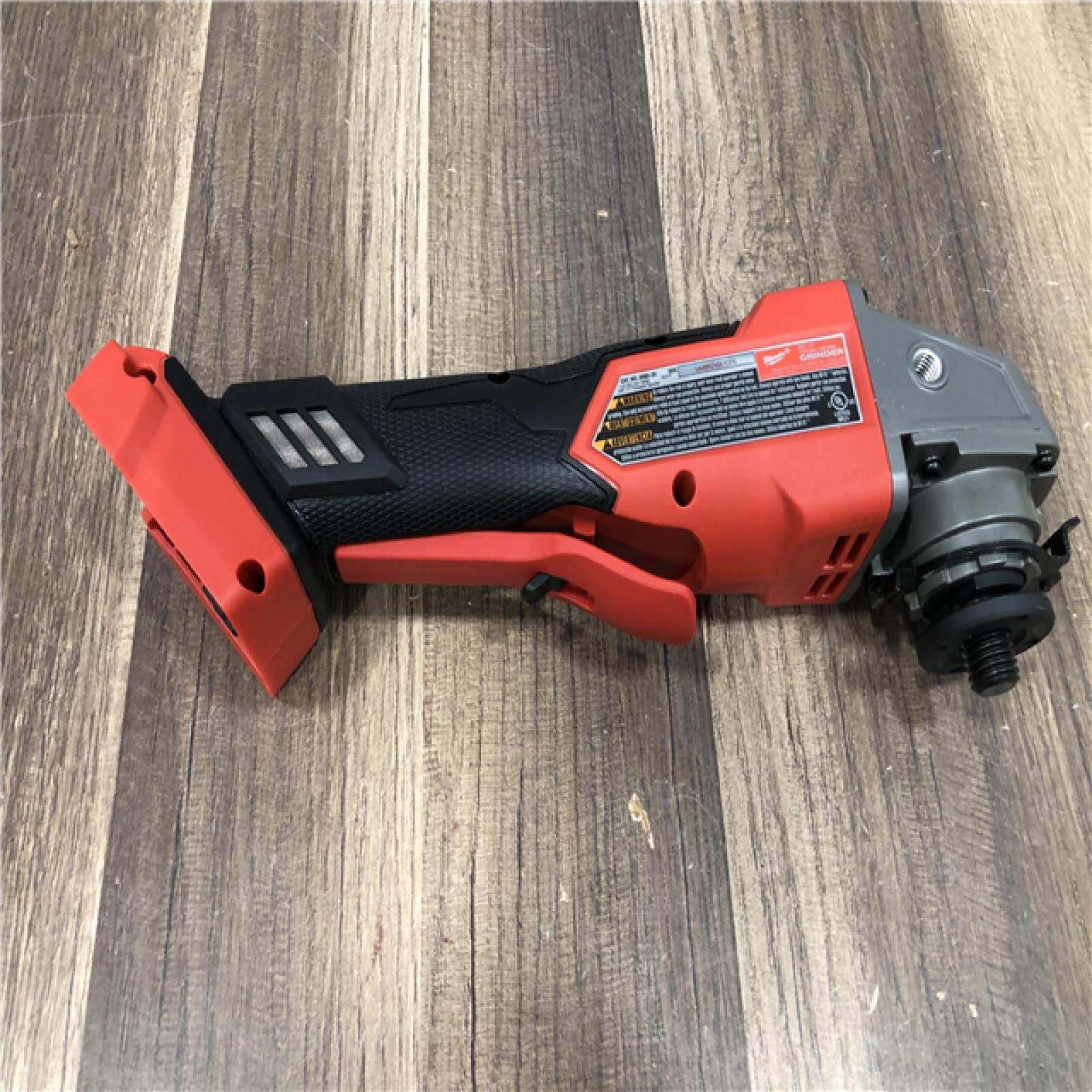 AS-IS Milwaukee  FUEL 18V Lithium-Ion Brushless Cordless 4-1/2 in./5 in. Grinder w/Paddle Switch (Tool-Only)