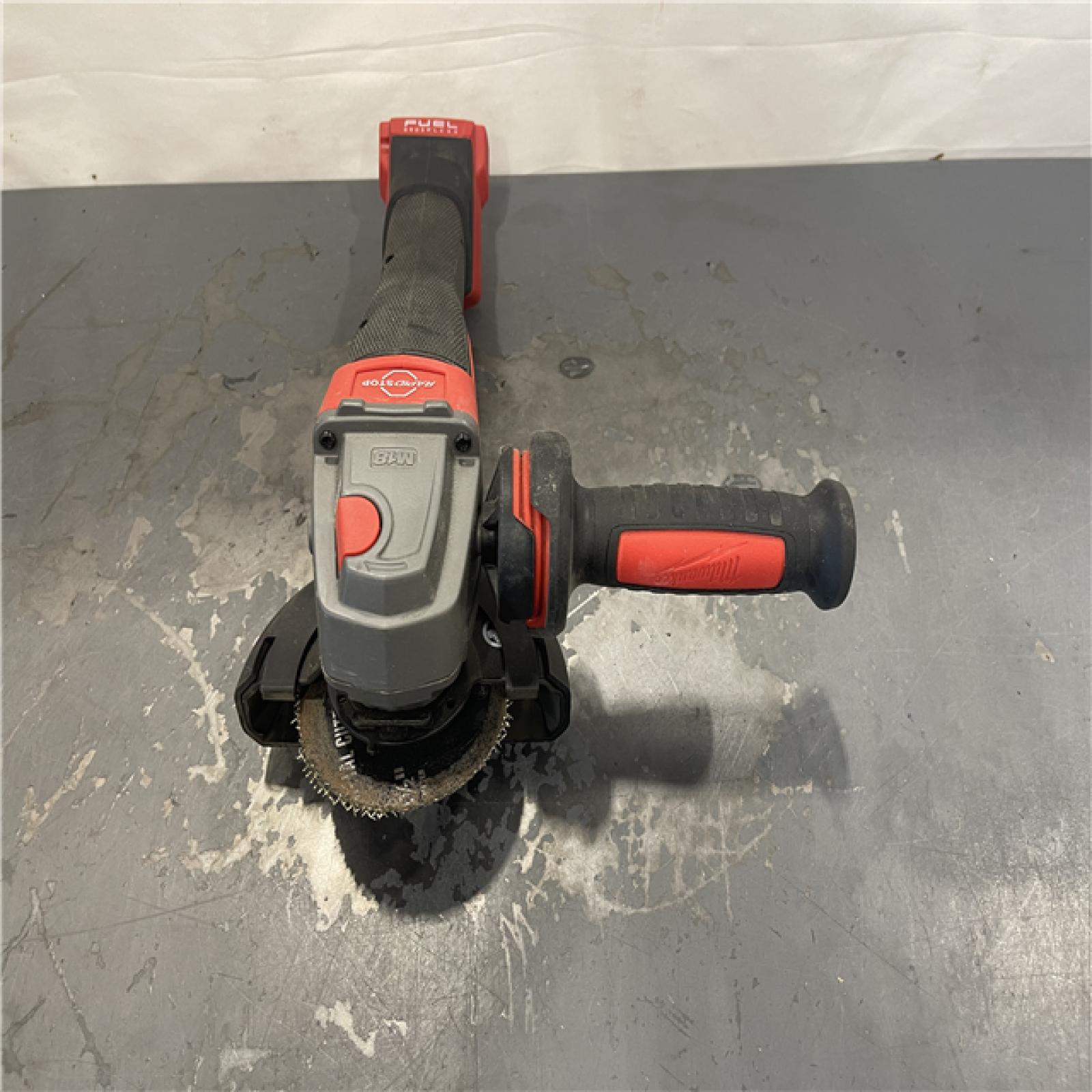 AS-IS- Milwaukee FUEL 18-Volt Lithium-Ion Brushless Cordless 4-1/2 in./5 in. Grinder W/Paddle Switch (Tool-Only)