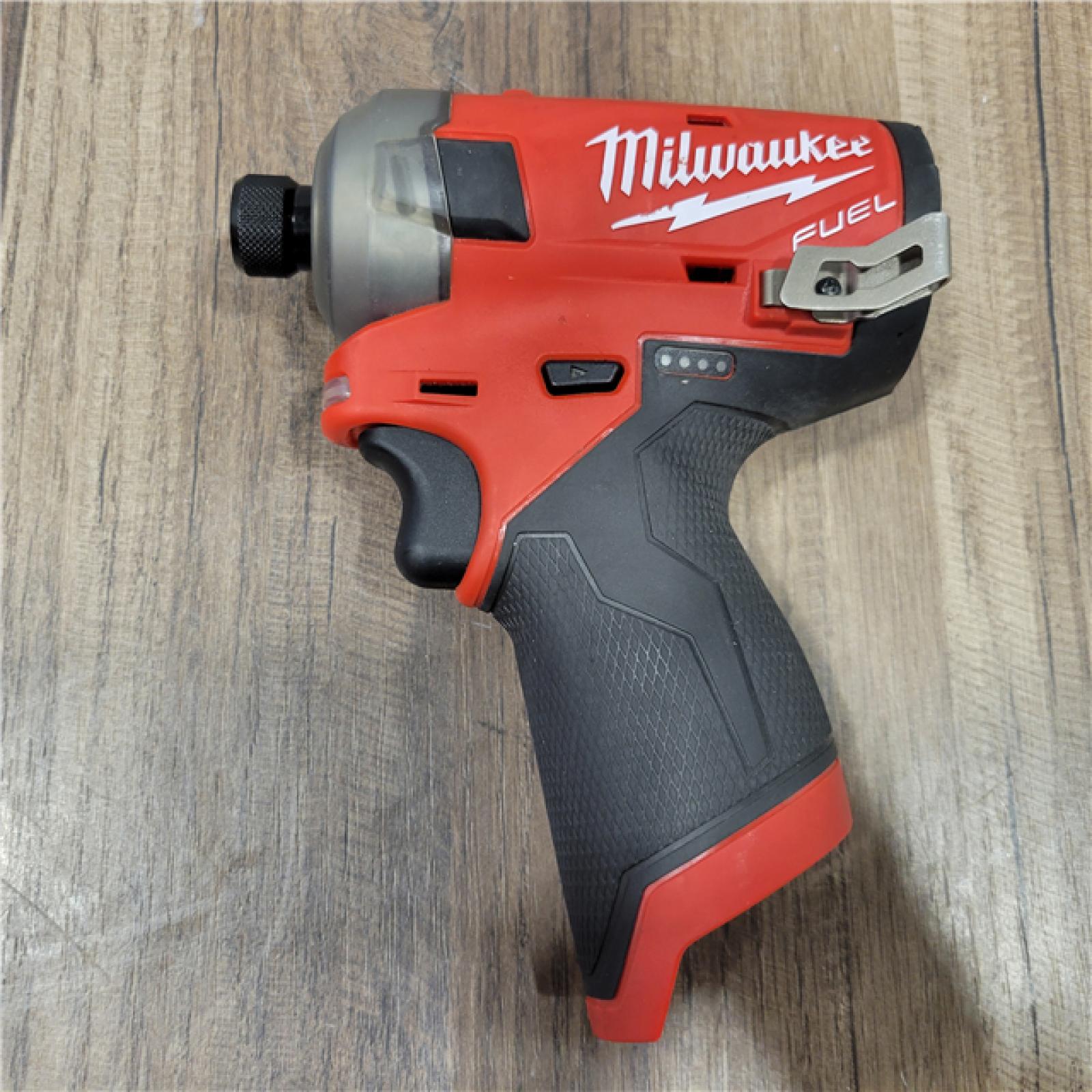 AS-IS Milwaukee M12 FUEL SURGE 12V Lithium-Ion Brushless Cordless 1/4 in. Hex Impact Driver Compact Kit W/Two 2.0Ah Batteries, Bag