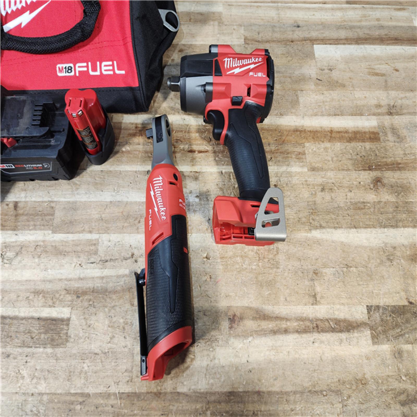 HOUSTON LOCATION - AS - IS Milwaukee FUEL 18V Cordless Mid Torque 1/2 in. Impact Wrench w/ 12 FUEL 3/8 in. Ratchet Combo Kit