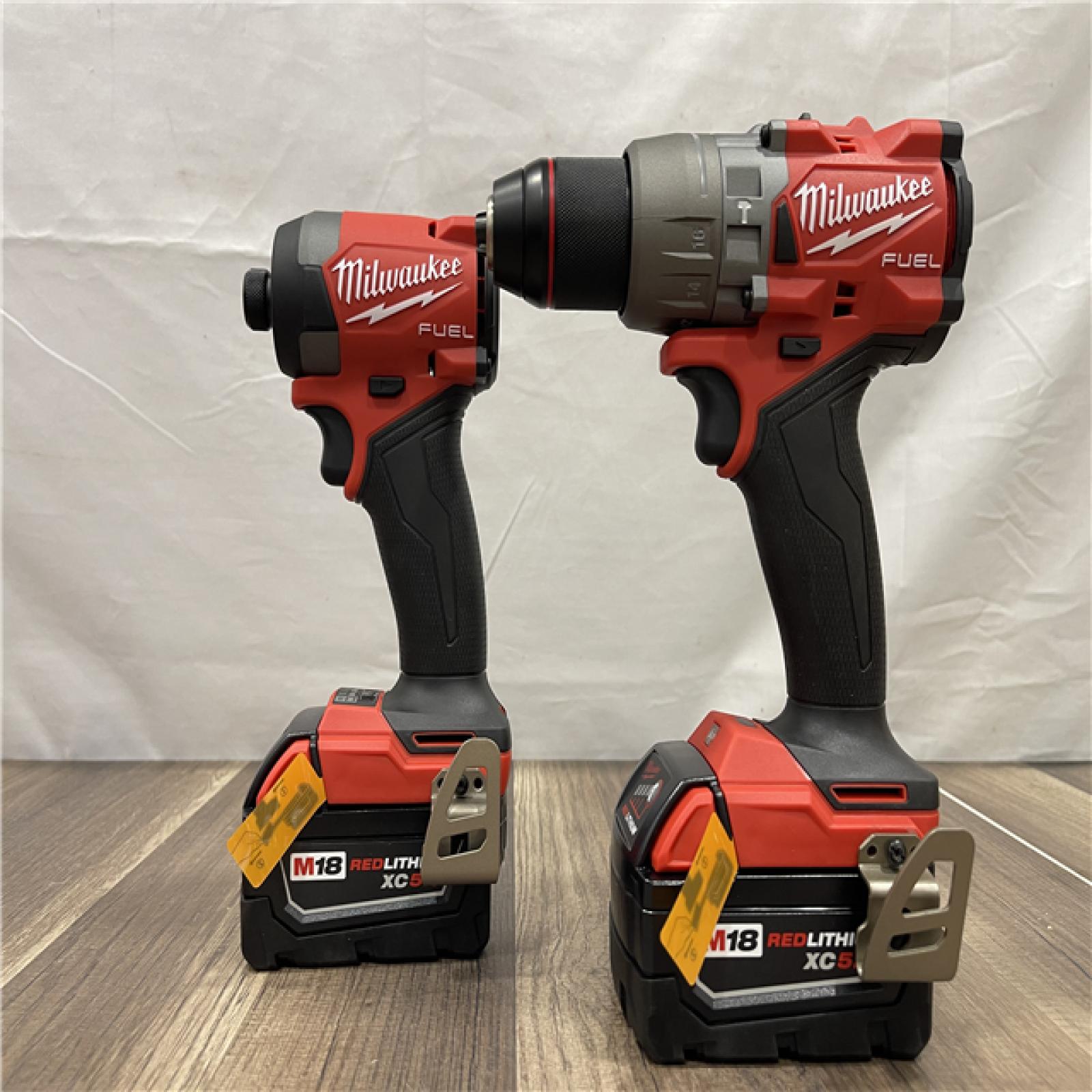 AS-IS Milwaukee M18 FUEL 18V Lithium-Ion Brushless Cordless Hammer Drill and Impact Driver Combo Kit