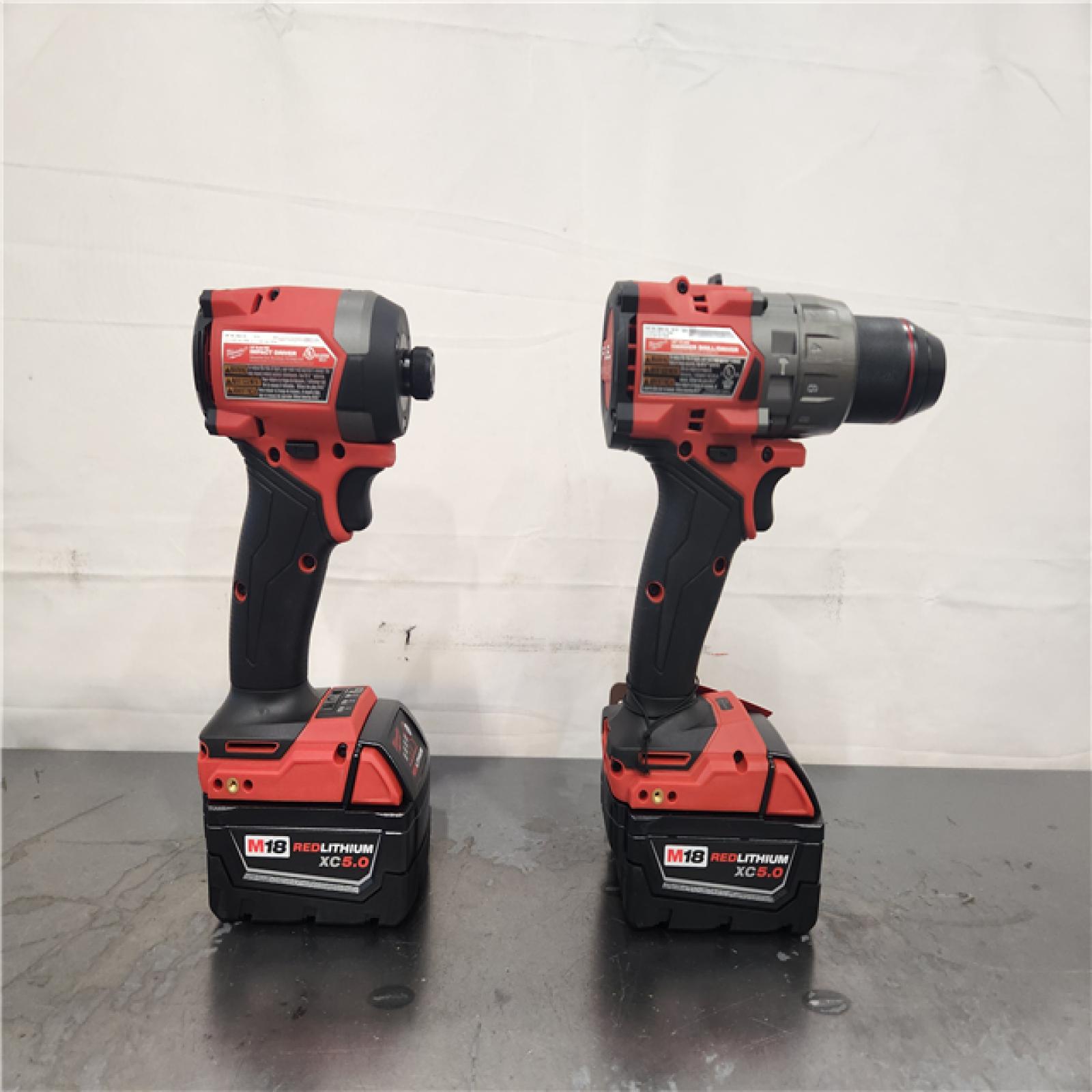 AS-IS- Milwaukee  FUEL 18V Lithium-Ion Brushless Cordless Hammer Drill and Impact Driver Combo Kit