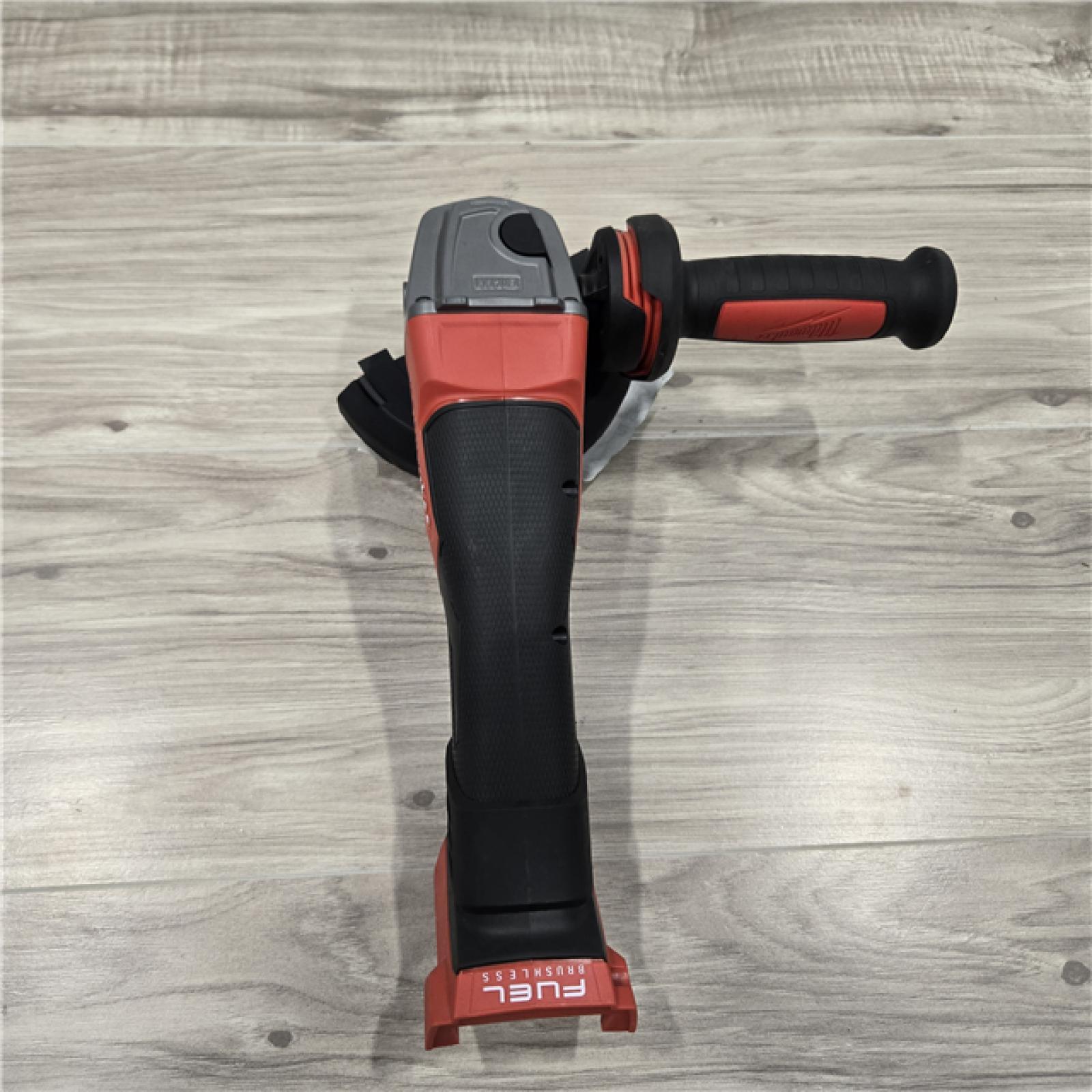 AS-IS Milwaukee 2880-20 FUEL 18-Volt Lithium-Ion Brushless Cordless 4-1/2 in./5 in. Grinder W/Paddle Switch (Tool-Only)