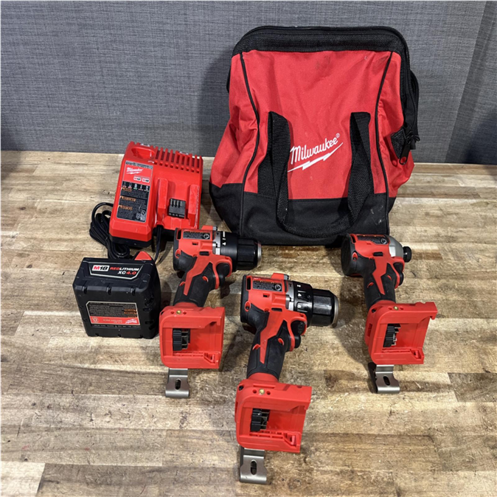 Houston Location AS-IS Milwaukee Hammer Drill Drivers QTY/2 and Impact Driver and Battery with Charger