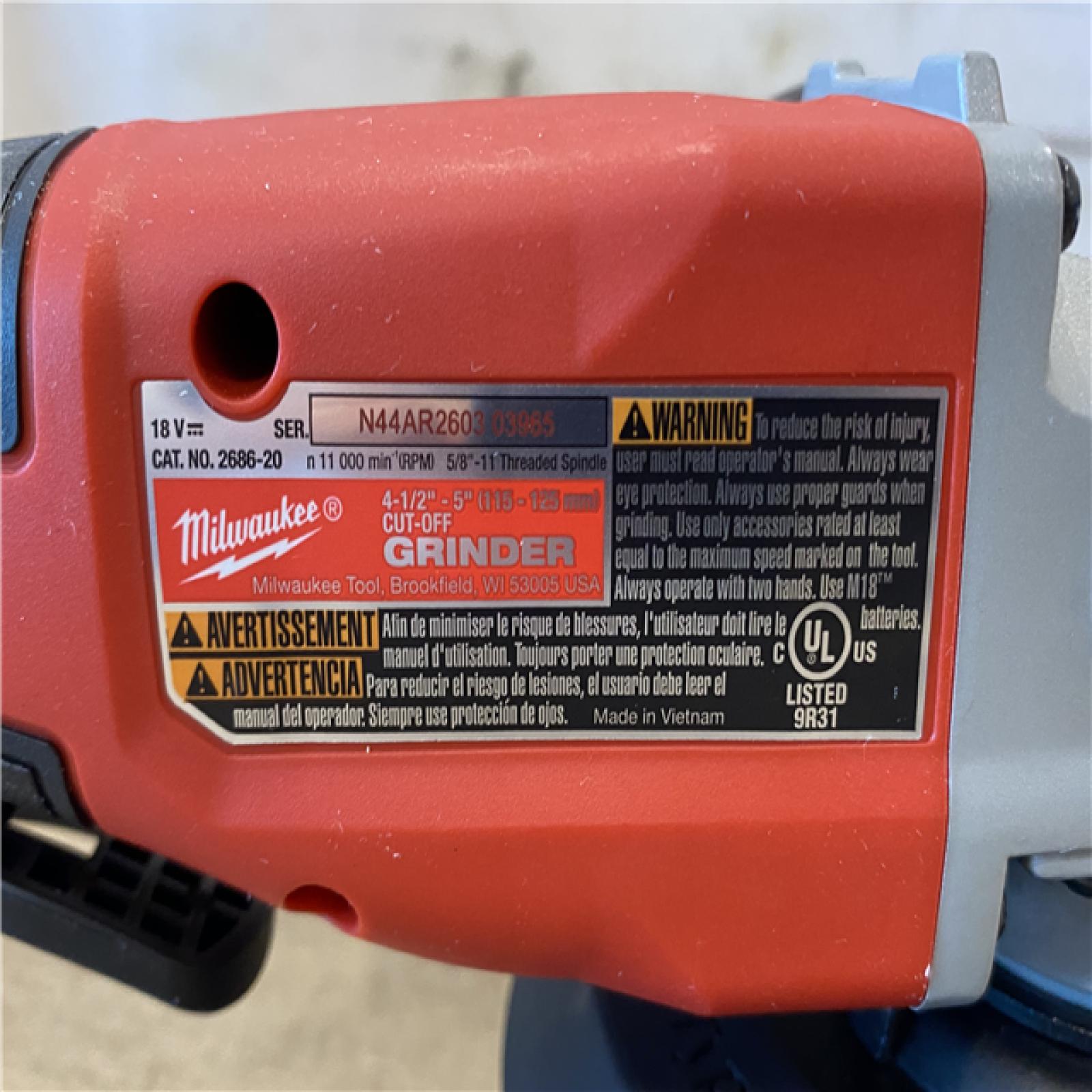 AS-IS Milwaukee 18V Lithium-Ion Brushless Cordless 4-1/2 in./5 in. Grinder w/Paddle Switch (Tool-Only)