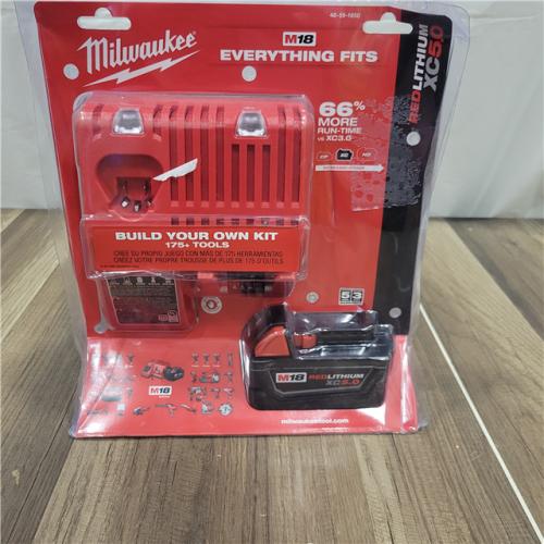 AS-IS Milwaukee M18 18-Volt Lithium-Ion XC Starter Kit with (1) 5.0Ah Battery and Charger