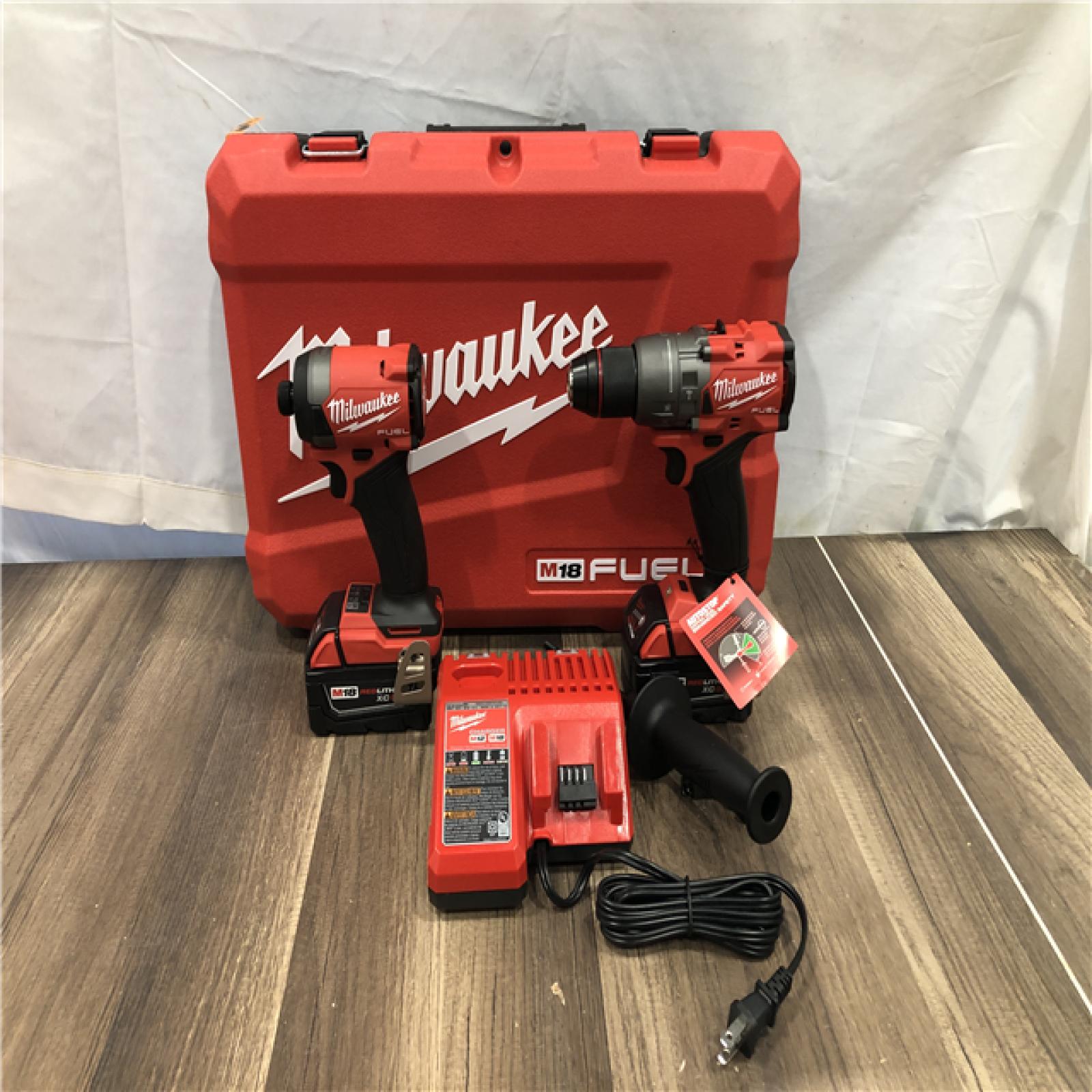 AS-IS Milwaukee FUEL 18V Lithium-Ion Brushless Cordless Hammer Drill and Impact Driver Combo Kit