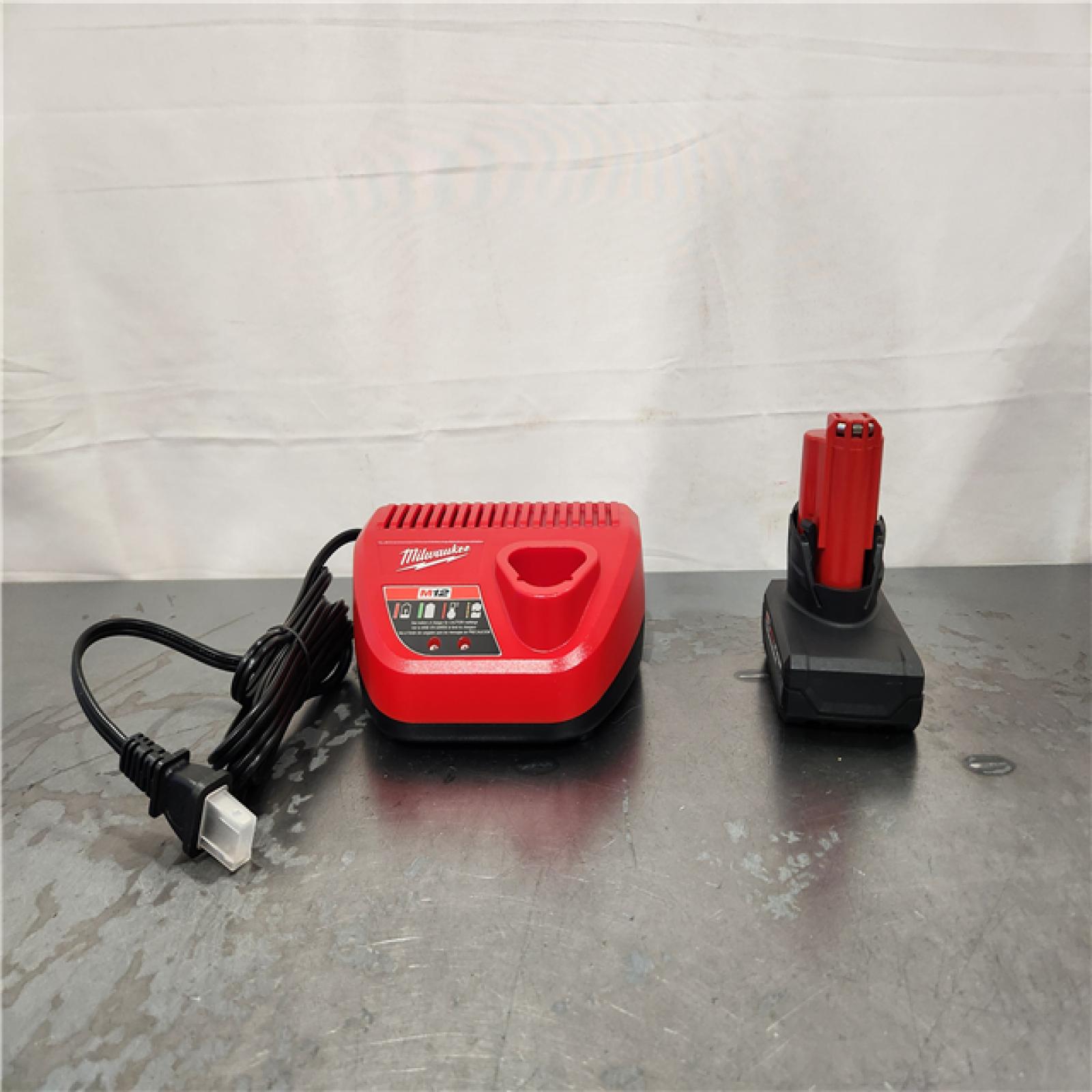 AS-IS- Milwaukee 12-Volt Lithium-Ion XC High Output 5.0 Ah Battery Pack with Charger Starter Kit