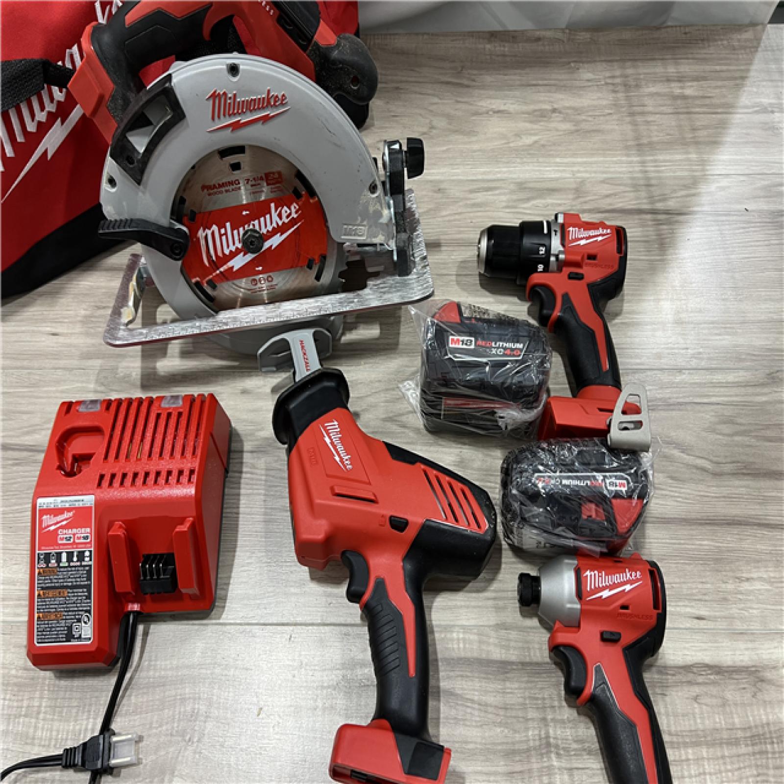 AS-IS Milwaukee 18-Volt Lithium-Ion Brushless Cordless (4-Tool) Combo Kit