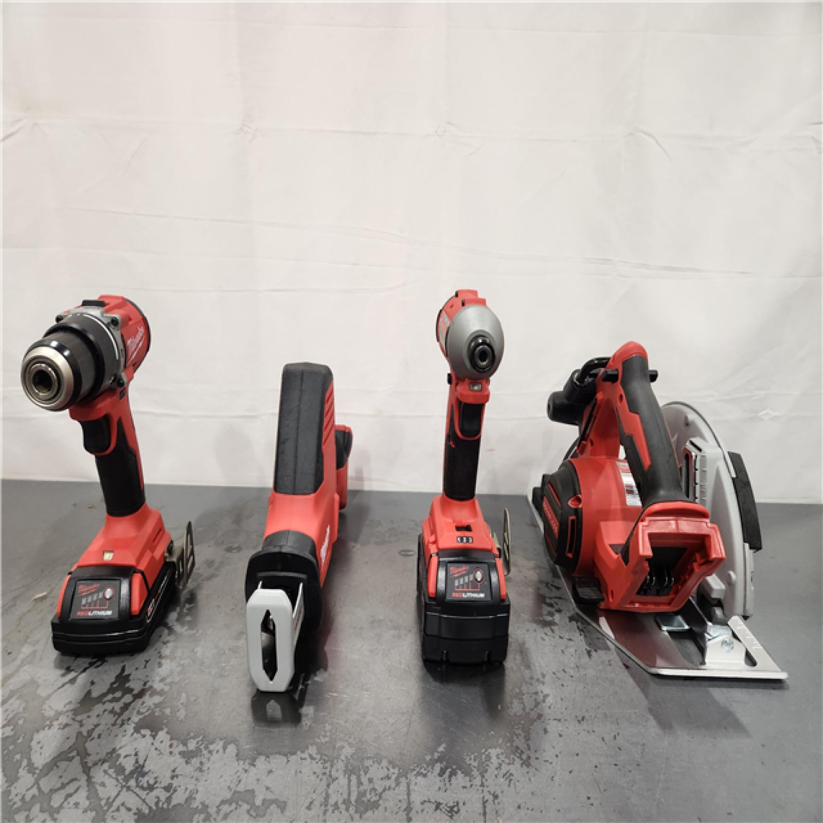AS-IS- M18 18-Volt Lithium-Ion Brushless Cordless Combo Kit (4-Tool) with 2-Batteries  1-Charger and Tool Bag