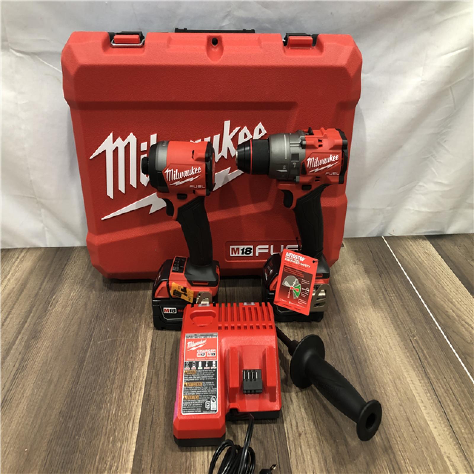 AS-IS Milwaukee FUEL 18V Lithium-Ion Brushless Cordless Hammer Drill and Impact Driver Combo Kit
