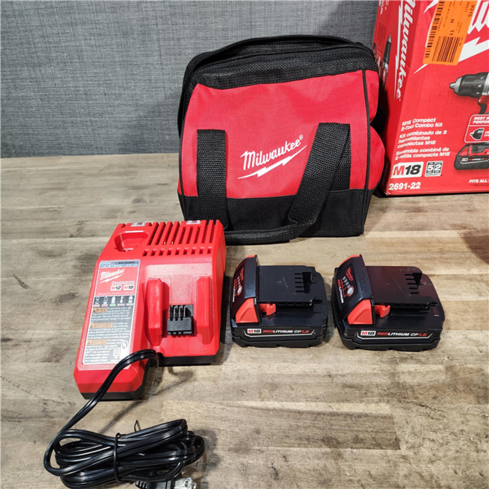 HOUSTON LOCATION - AS-IS Milwaukee M18 Brushed Cordless (2-Tool) Drill/Driver and Impact Driver Kit