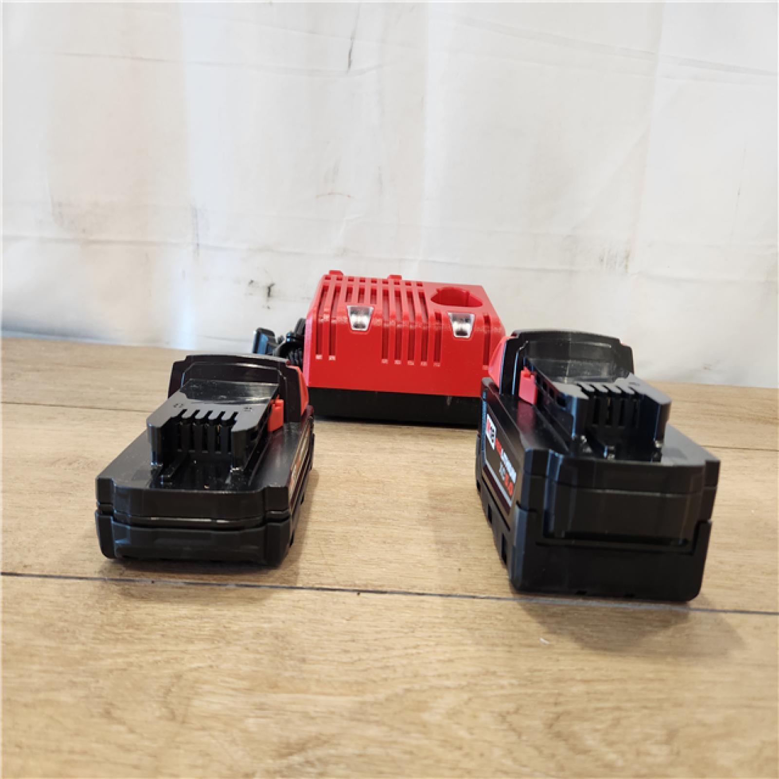 AS-IS- Milwaukee M18 Redlithium Xc5.0 Resistant Battery Starter Kit