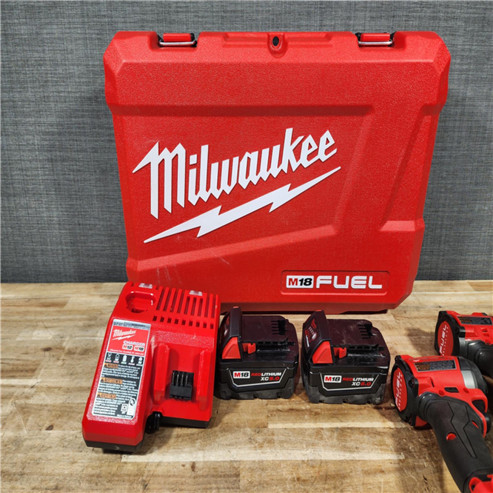 HOUSTON LOCATION - AS - IS Milwaukee FUEL 18V Lithium-Ion Brushless Cordless Hammer Drill and Impact Driver Combo Kit