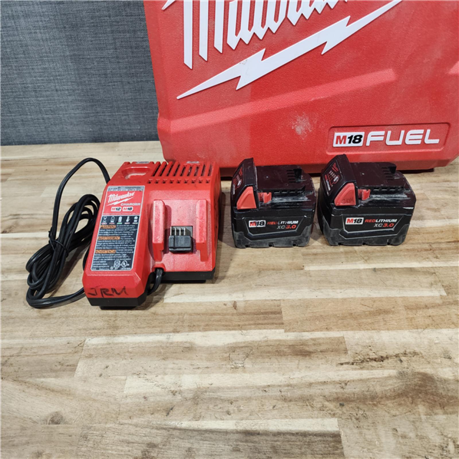 HOUSTON LOCATION - AS-IS Milwaukee FUEL 18V Lithium-Ion Brushless Cordless Hammer Drill and Impact Driver Combo Kit