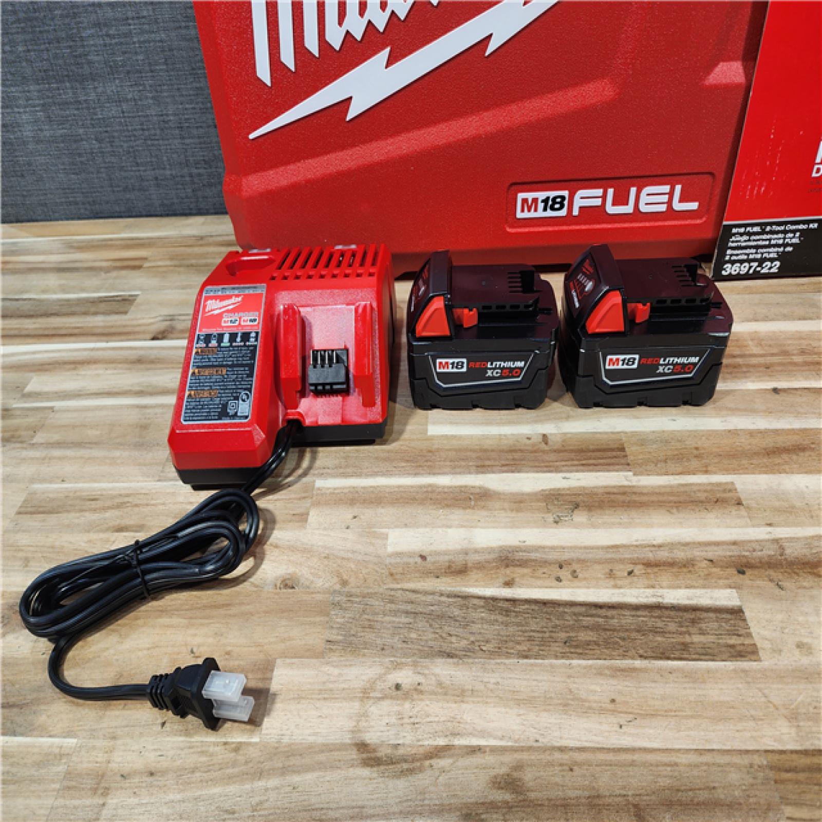 HOUSTON LOCATION - AS-IS (APPEARS LIKE NEW) Milwaukee  FUEL 18V Lithium-Ion Brushless Cordless Hammer Drill and Impact Driver Combo Kit