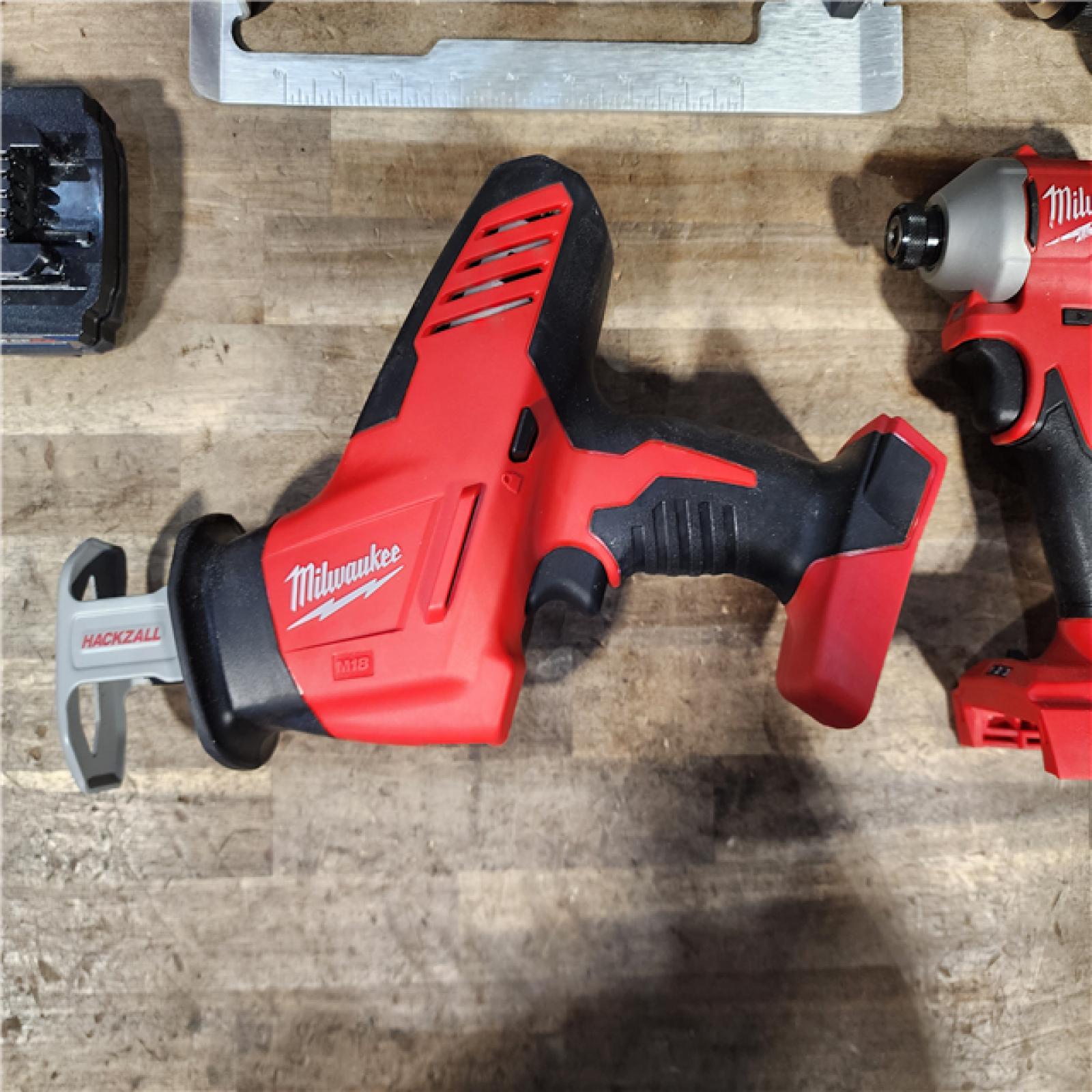 HOUSTON LOCATION - AS-IS Milwaukee M18 18-Volt Lithium-Ion Brushless Cordless Combo Kit (4-Tool) with 2-Batteries  1-Charger and Tool Bag