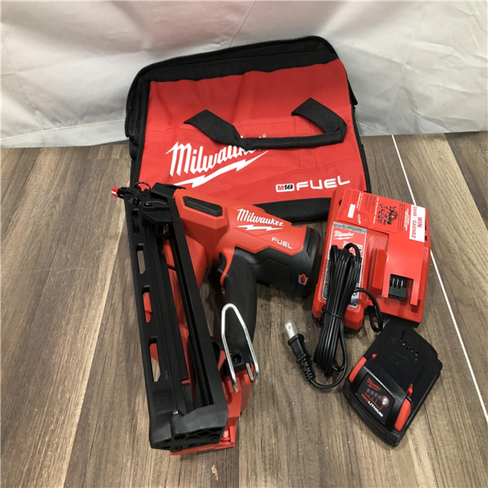 AS-IS Milwaukee  FUEL 18-Volt Lithium-Ion Brushless Cordless Gen II 15-Gauge Angled Finish Nailer Kit