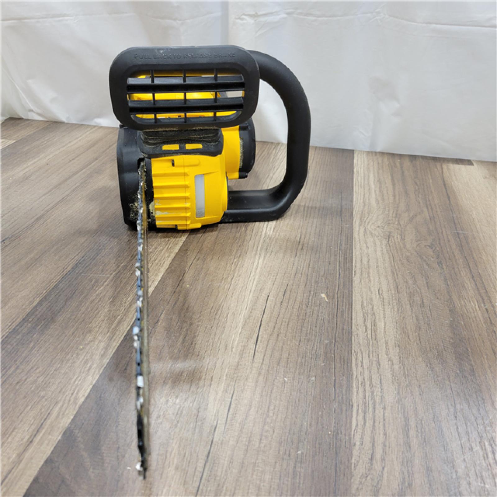 AS-IS  DEWALT FLEXVOLT 60V MAX 16in. Brushless Cordless Battery Powered Chainsaw Kit with (1) FLEXVOLT 2 Ah Battery & Charger