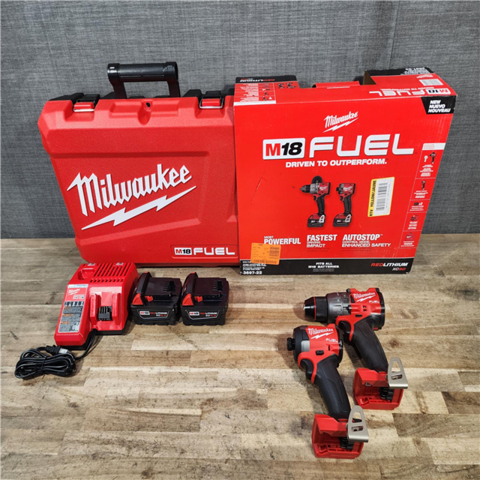 HOUSTON LOCATION - AS-IS (APPEARS LIKE NEW) Milwaukee  FUEL 18V Lithium-Ion Brushless Cordless Hammer Drill and Impact Driver Combo Kit