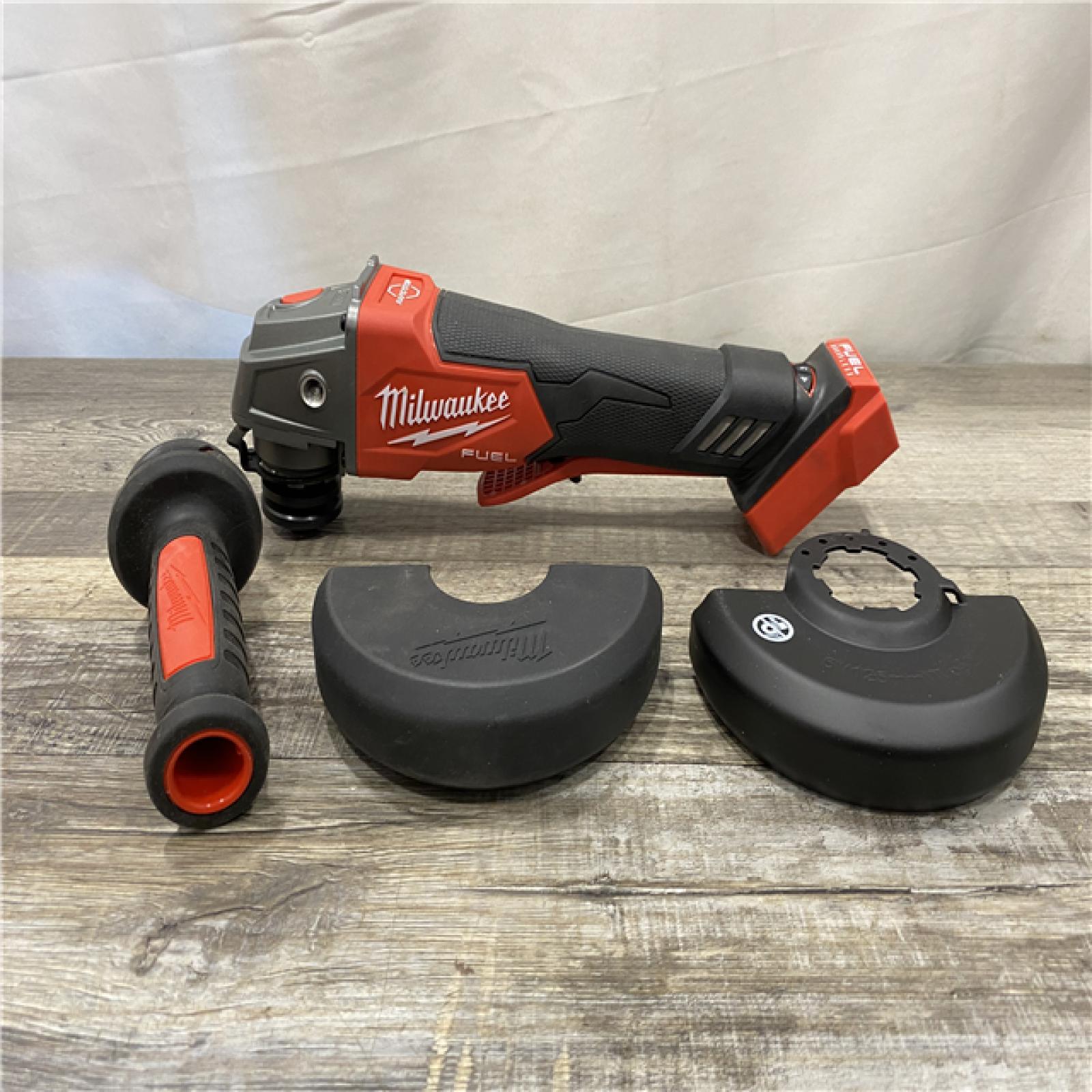 AS-IS Milwaukee FUEL 18V Lithium-Ion Brushless Cordless 4-1/2 in./5 in. Grinder with Variable Speed & Paddle Switch (Tool-Only)