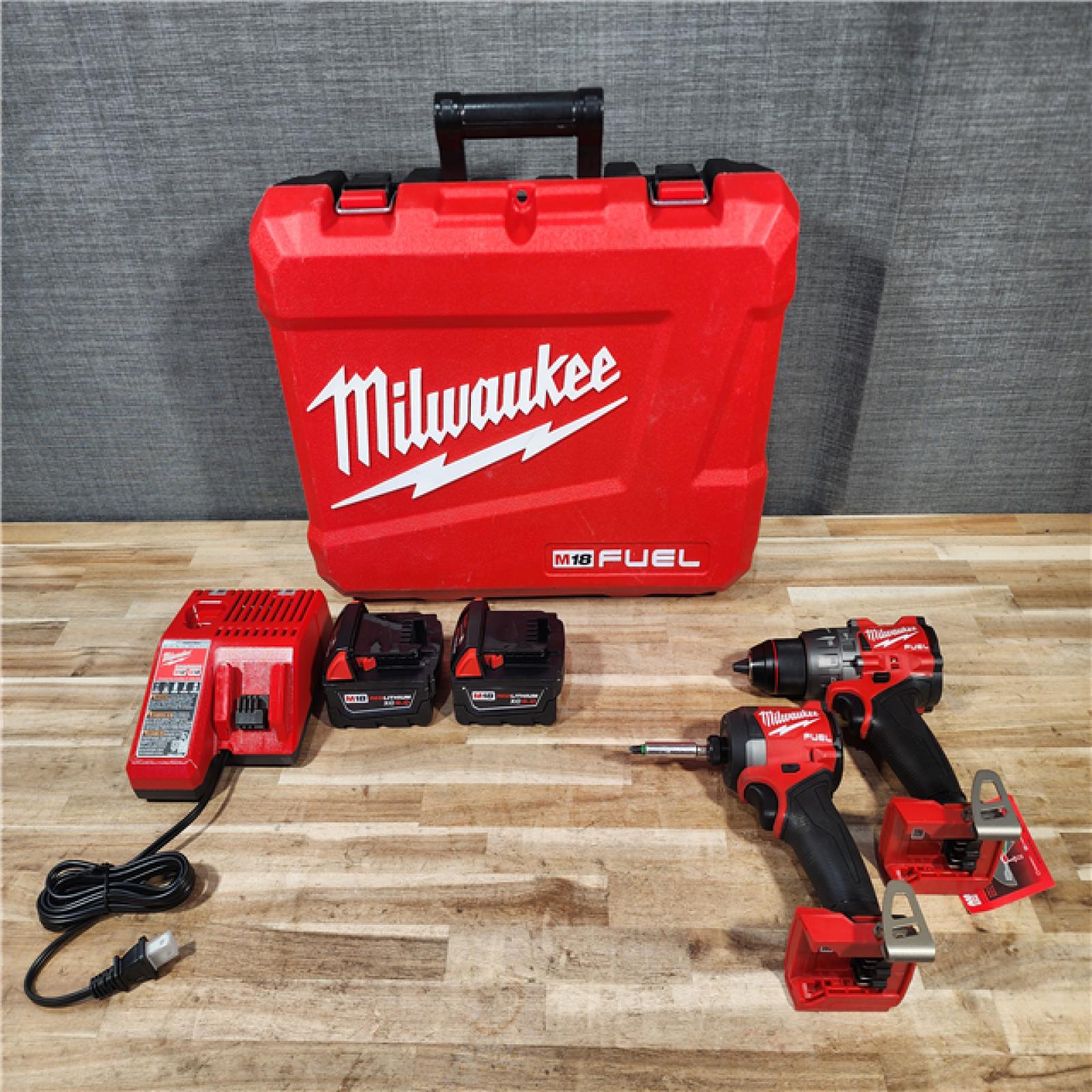 HOUSTON LOCATION - AS-IS Milwaukee  FUEL 18V Lithium-Ion Brushless Cordless Hammer Drill and Impact Driver Combo Kit