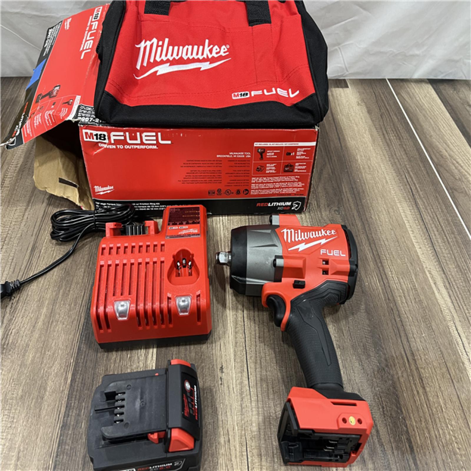 AS-IS Milwaukee M18 1/2 in. Cordless Brushless High Torque Impact Wrench Kit (Battery & Charger)
