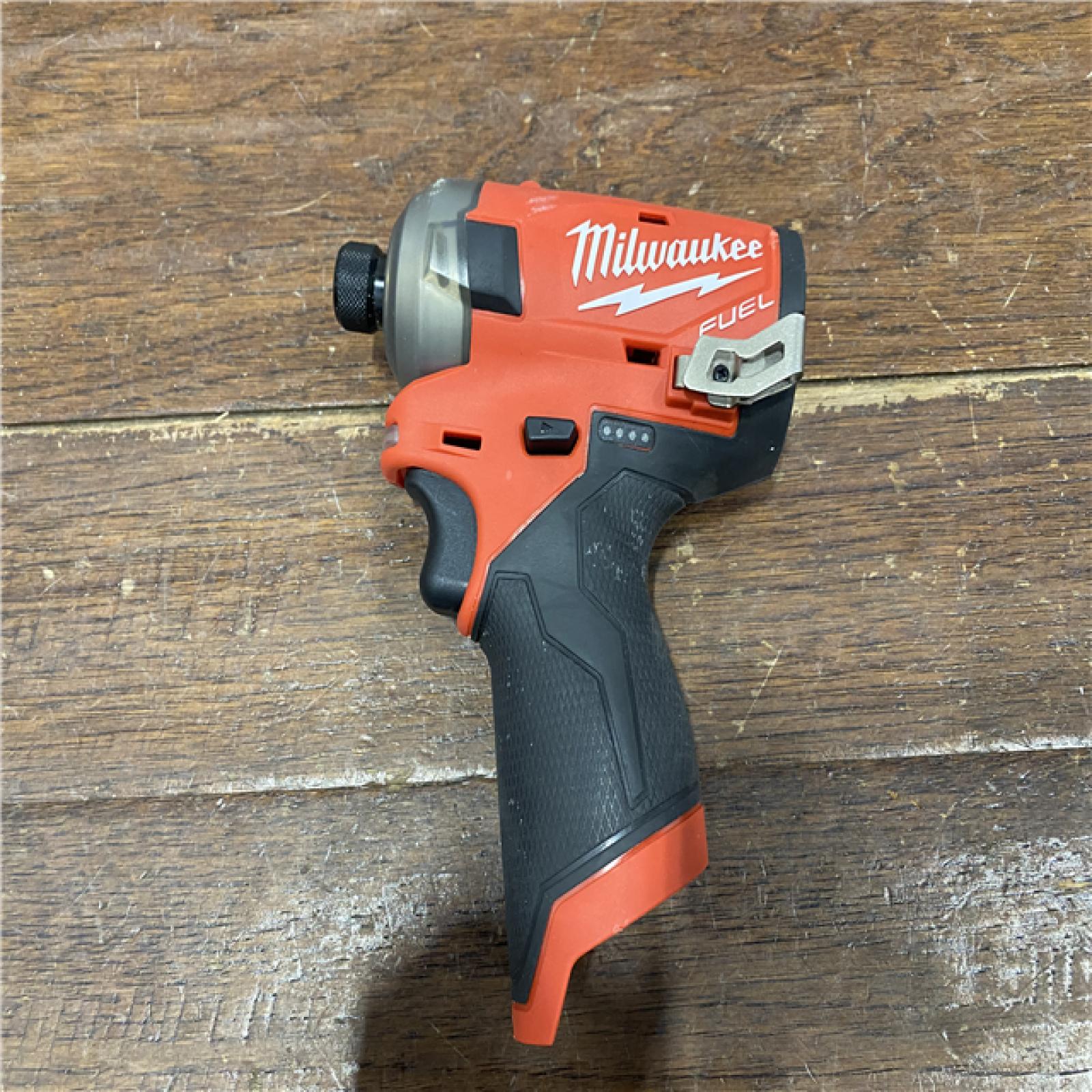 AS-IS M12 FUEL SURGE 12V Lithium-Ion Brushless Cordless 1/4 in. Hex Impact Driver Compact Kit W/Two 2.0Ah Batteries, Bag