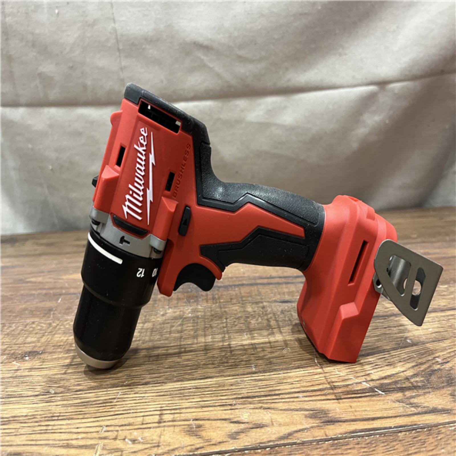 AS-IS Milwaukee M18 18-Volt Lithium-Ion Brushless Cordless Combo Kit (4-Tool) with 2-Batteries, 1-Charger and Tool Bag