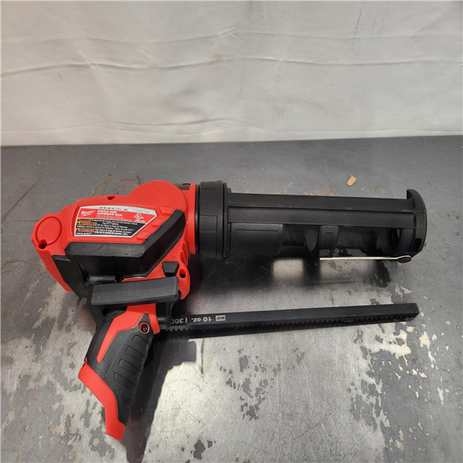AS-IS- Milwaukee 12V Lithium-Ion Cordless 10 oz. Adhesive and Caulk Gun (Tool-Only)