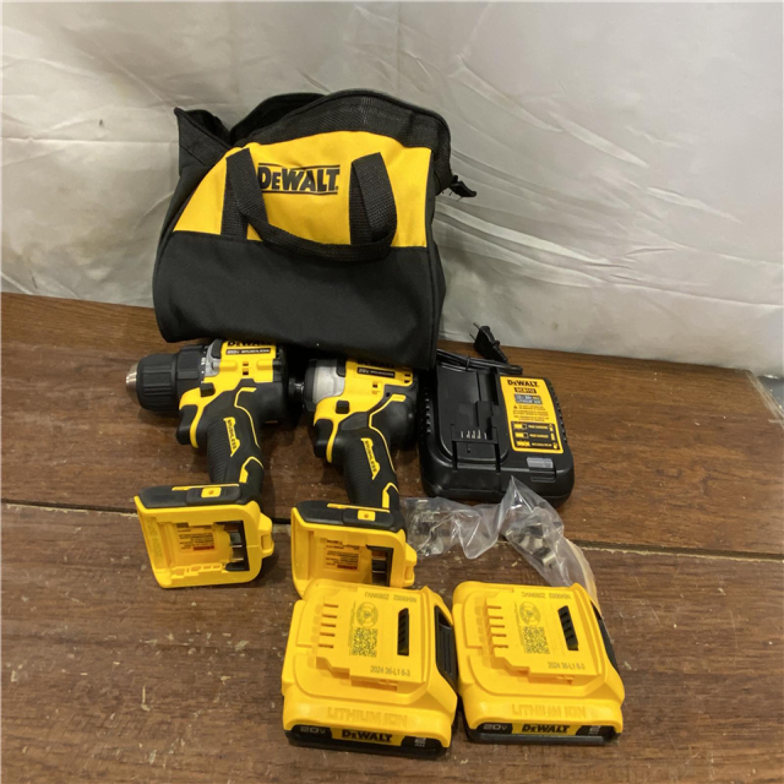 AS-IS Dewalt DCK225D2 20V MAX ATOMIC Brushless Compact Lithium-Ion 1/2 in. Cordless Drill Driver and 1/4 in. Impact Driver Combo Kit with 2 Batteries 2 Ah