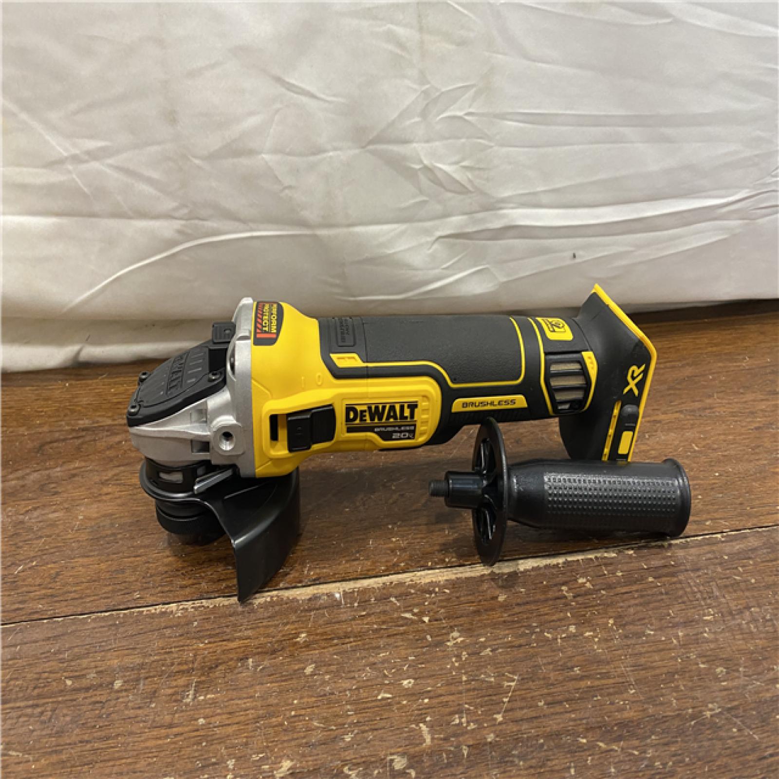 AS-IS DeWalt DCG405B 20V Max XR 4.5-Inch Slide Switch Small Angle Grinder (Tool Only)