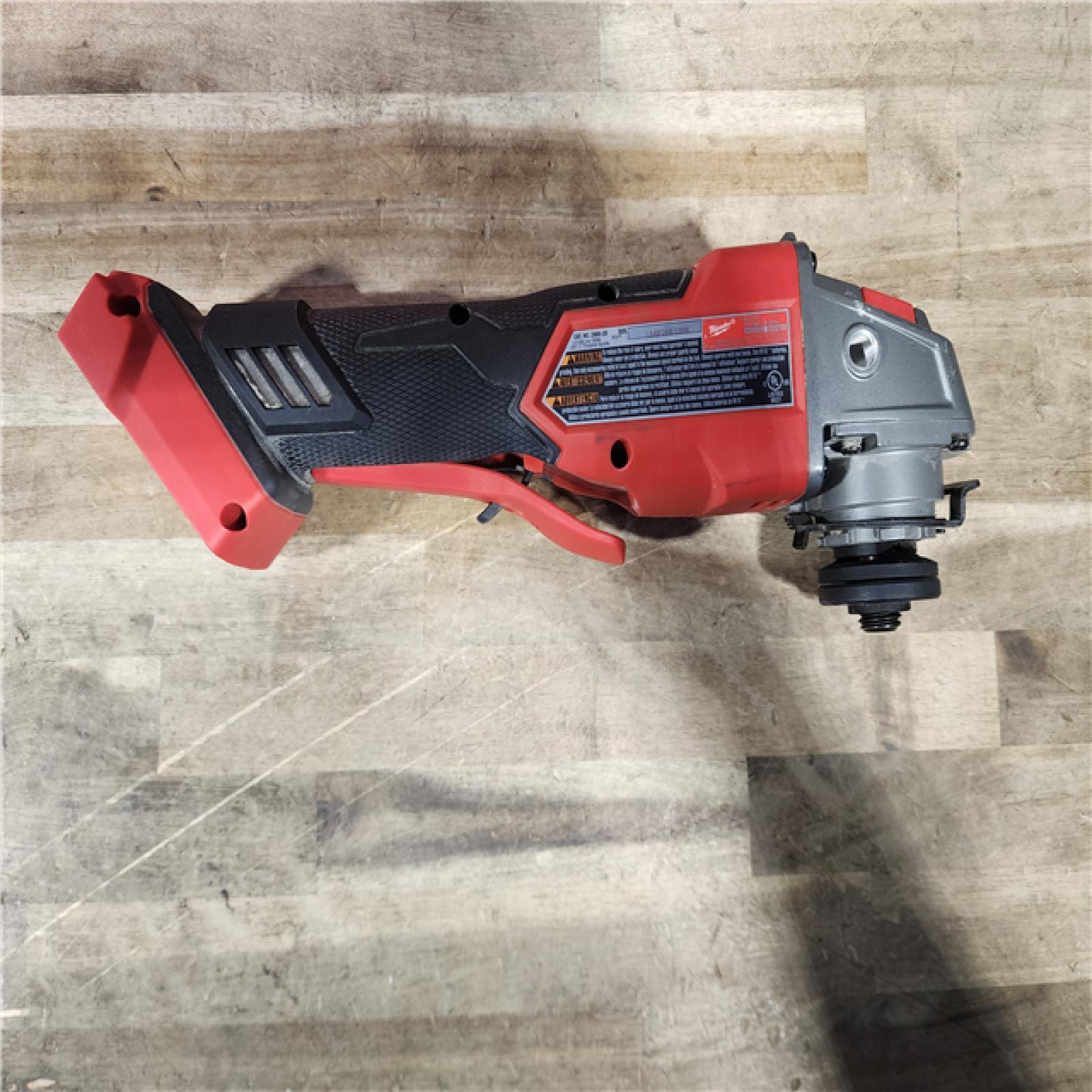 HOUSTON LOCATION - AS-IS Milwaukee 2880-20 FUEL 18-Volt Lithium-Ion Brushless Cordless 4-1/2 in./5 in. Grinder W/Paddle Switch (Tool-Only)