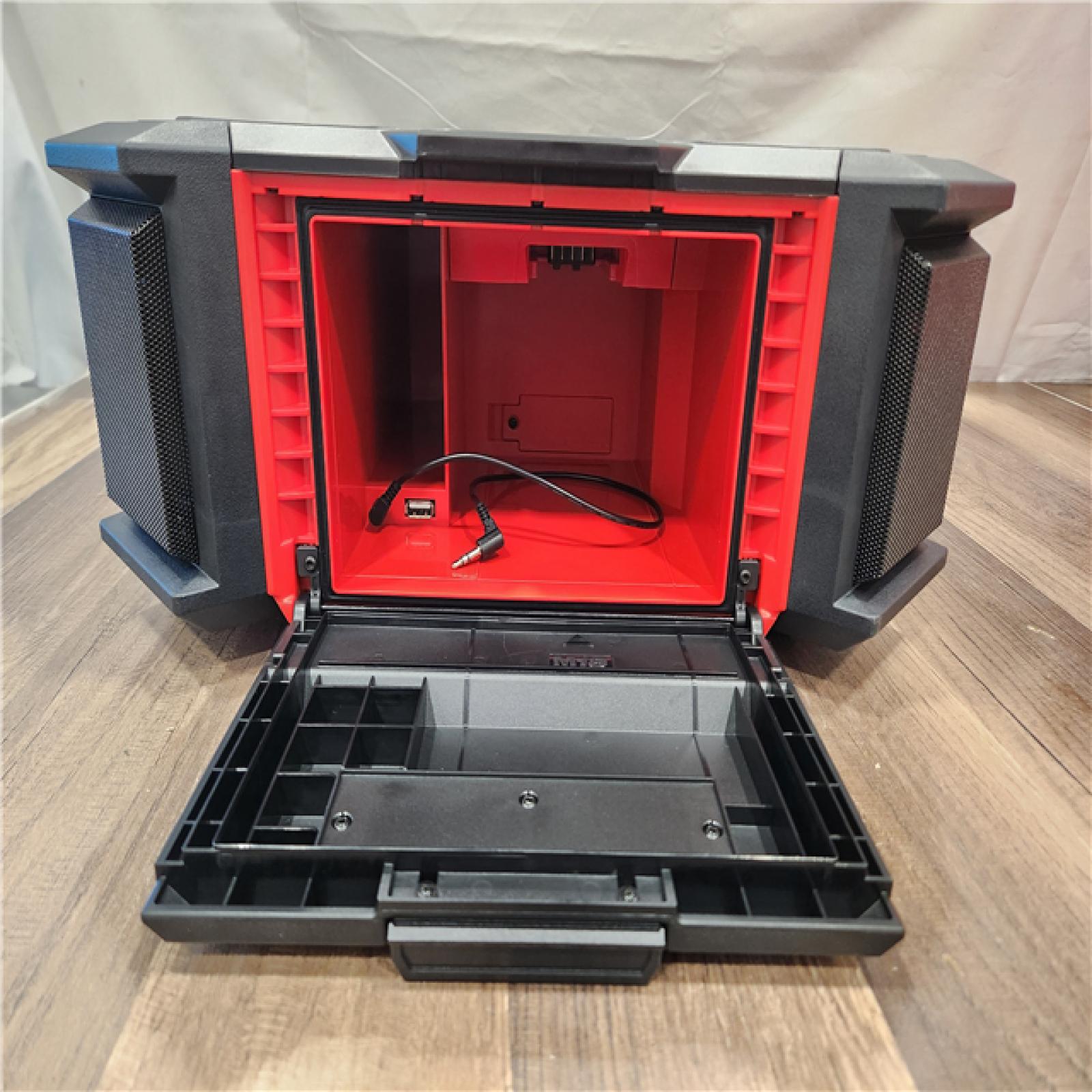 AS-IS- Milwaukee 18V M18 PACKOUT Lithium-Ion Cordless Radio + Charger (Tool Only)