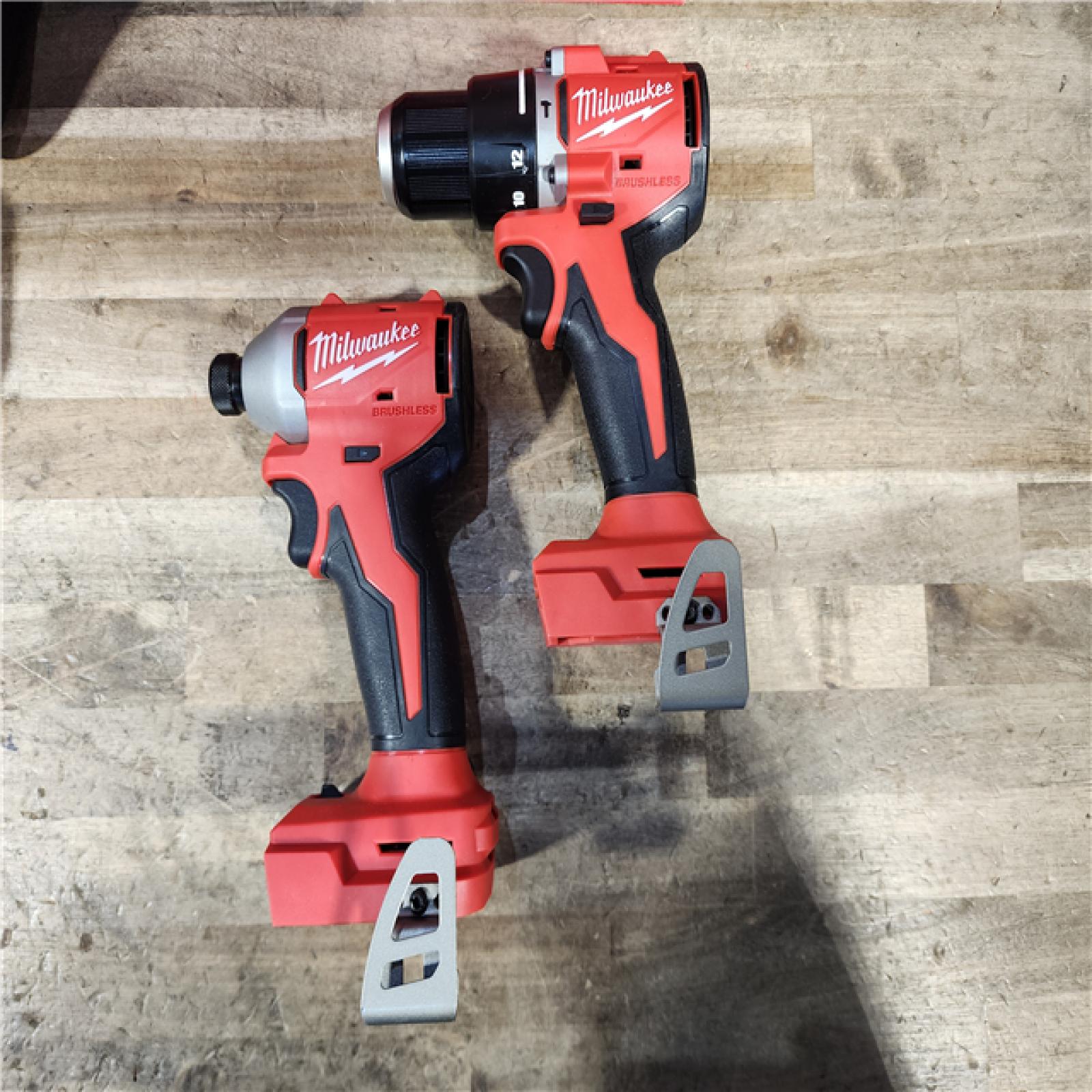 HOUSTON LOCATION - AS-IS Milwaukee M18 18V Lithium-Ion Brushless Cordless Compact Drill/Impact Combo Kit (2-Tool) W/(2) 2.0 Ah Batteries  Charger & Bag