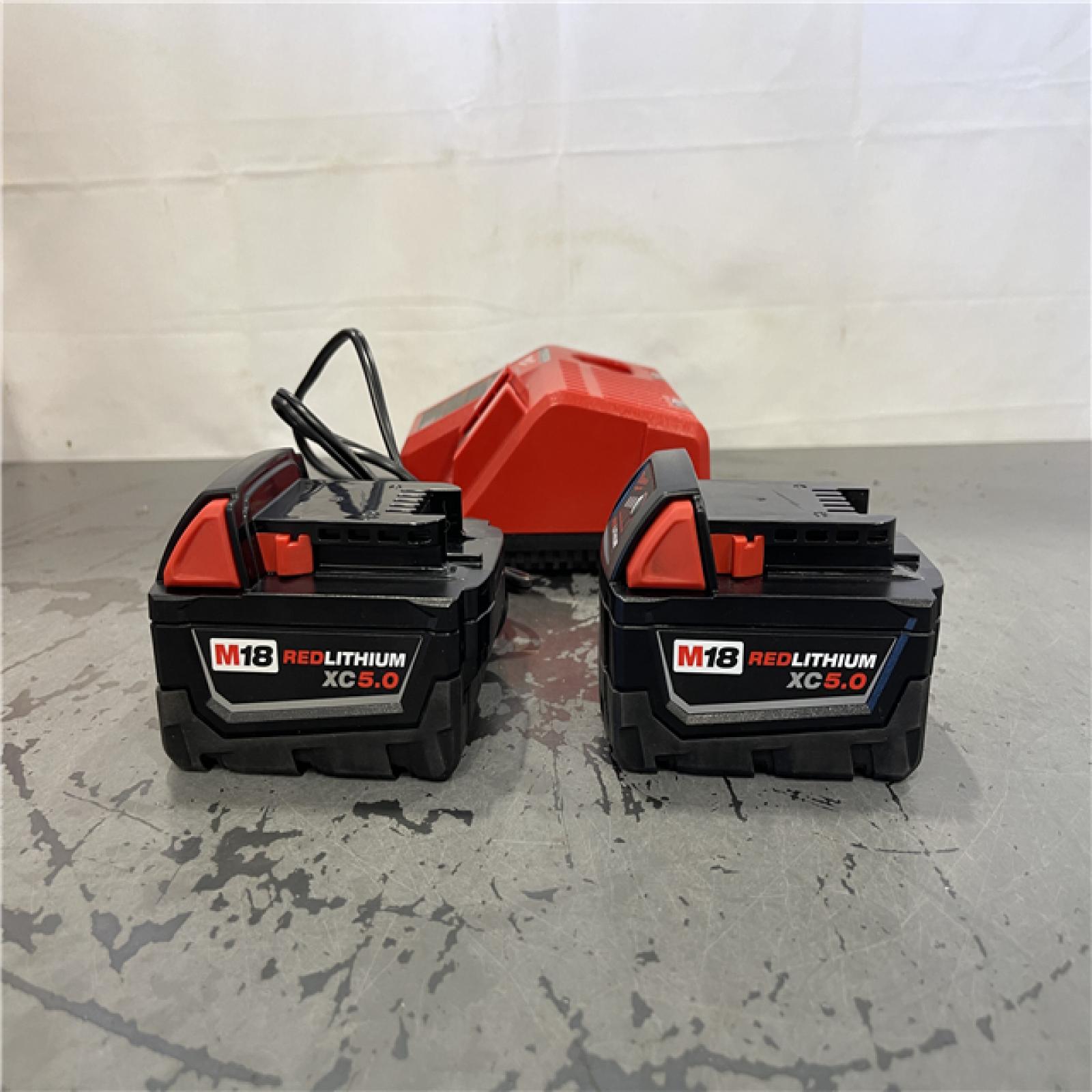 AS-IS- Milwaukee M18 18-Volt Lithium-Ion XC Starter Kit with Two 5.0Ah Batteries and Charger