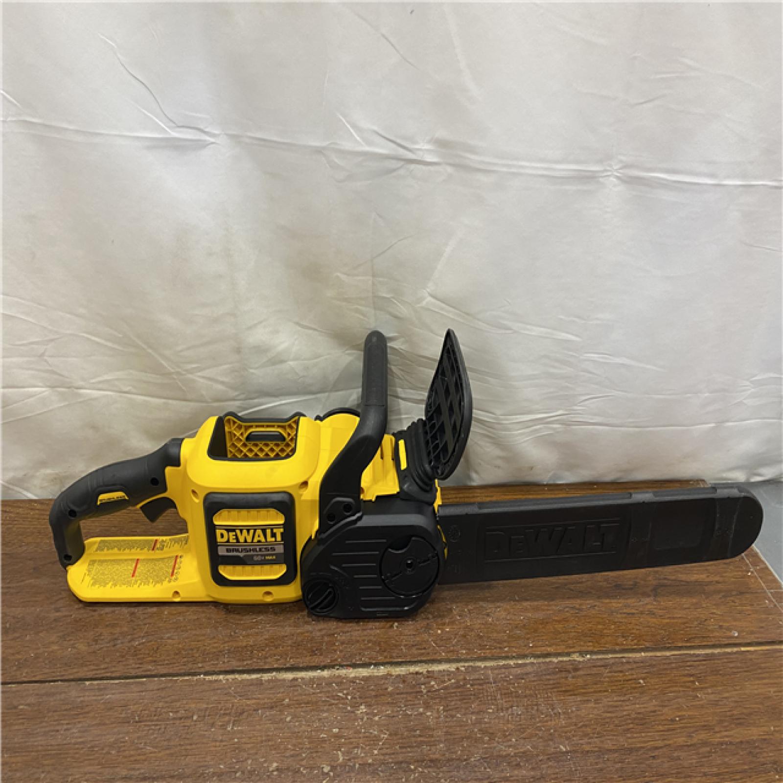 AS-IS DEWALT  FLEXVOLT 60V MAX 16in. Brushless Cordless Battery Powered Chainsaw Kit with (1) FLEXVOLT 2 Ah Battery & Charger