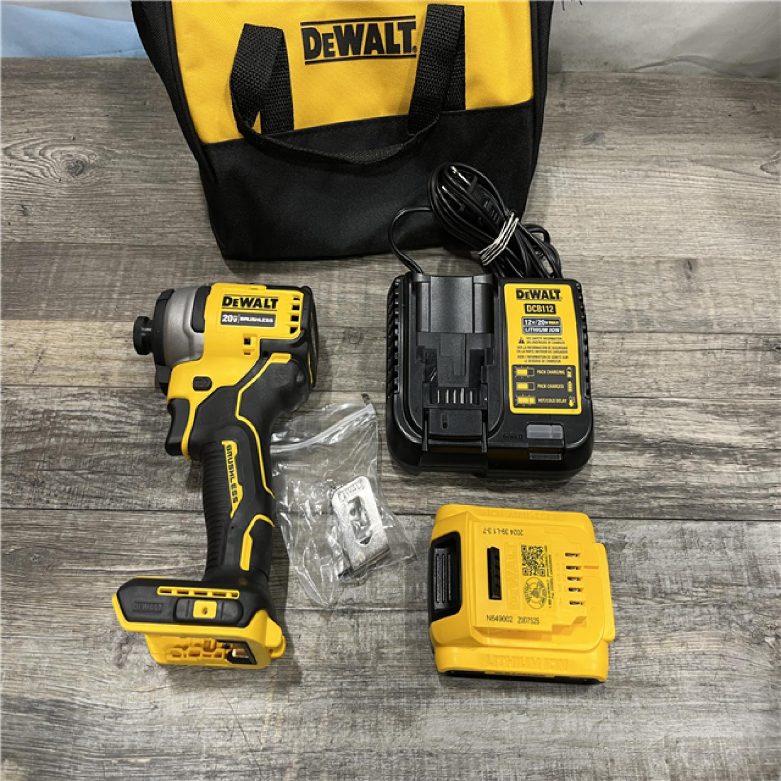 AS-IS DEWALT Atomic 20V Max Lithium-Ion Brushless Cordless Compact 1/4 in. Impact Driver Kit